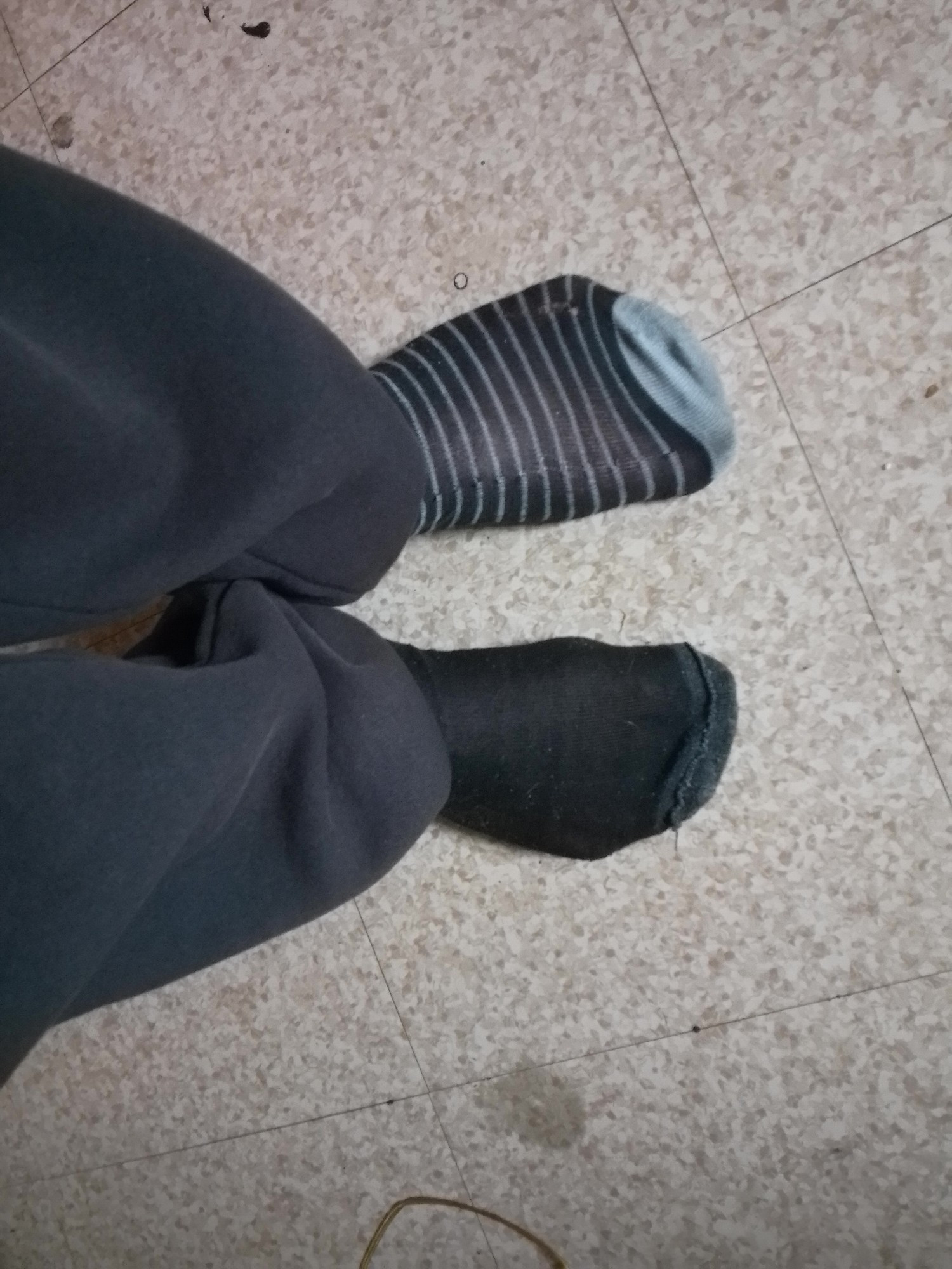 Me wearing odd socks and one is inside out