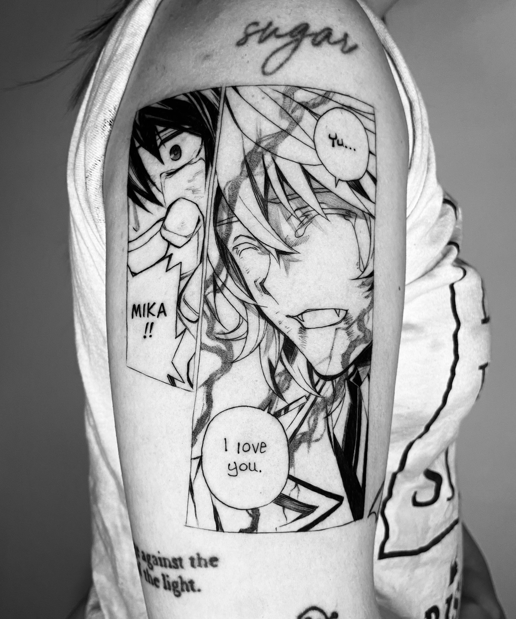 A black and white photo of a manga panel tattoo from Seraph of the End, ch. 90