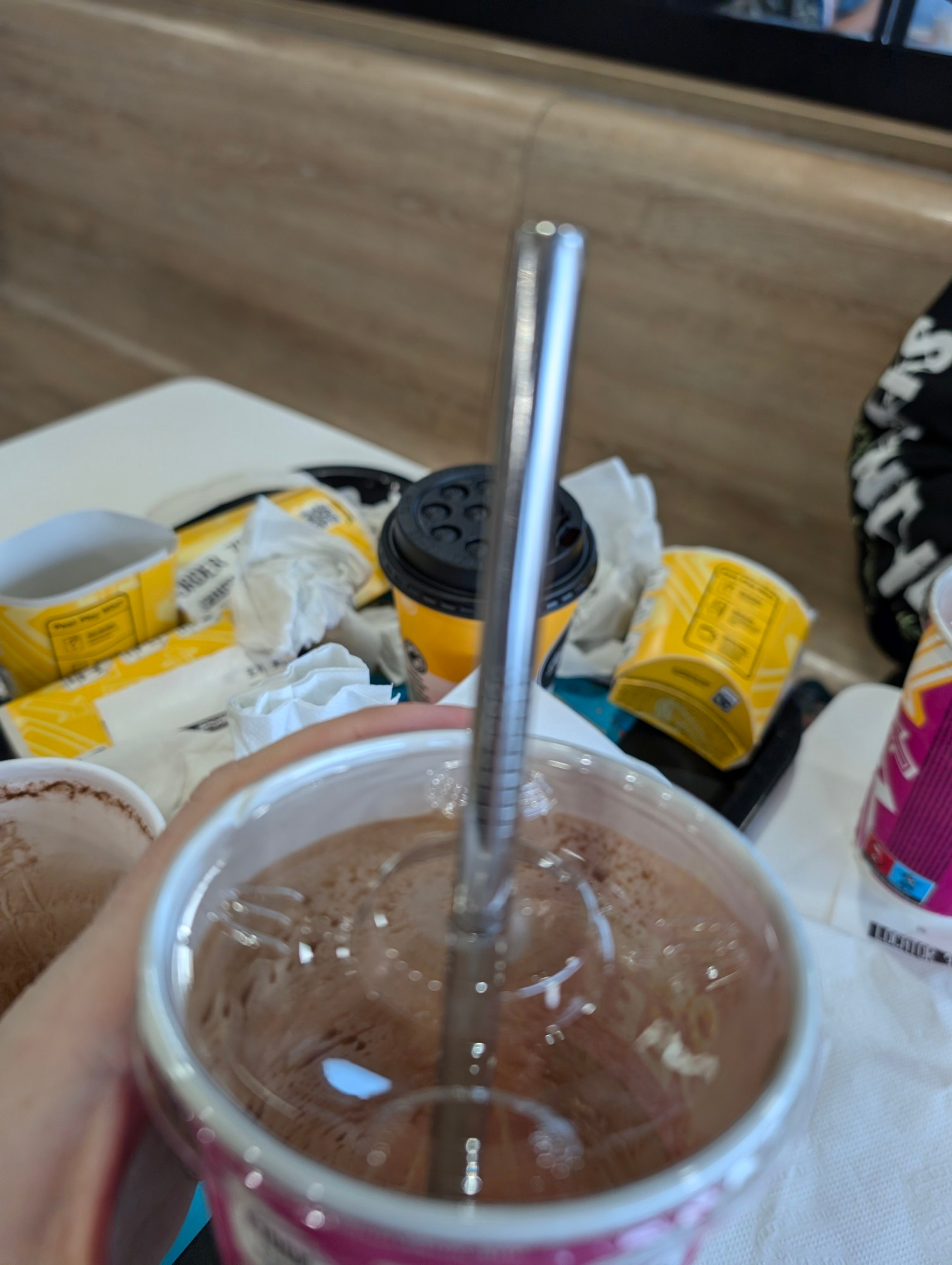 Metal straw in a Choc milkshake.