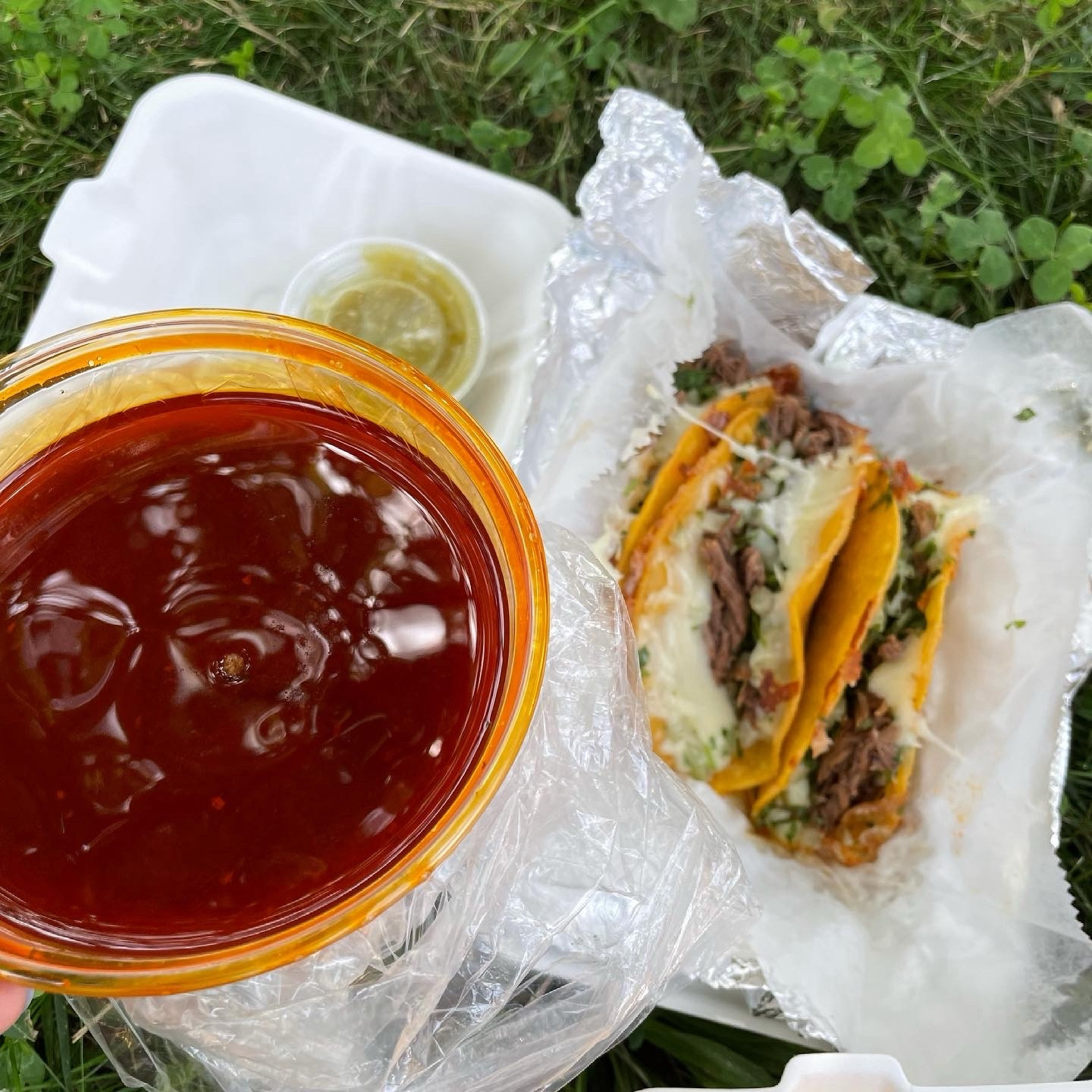 Birria tacos and tub of consomme