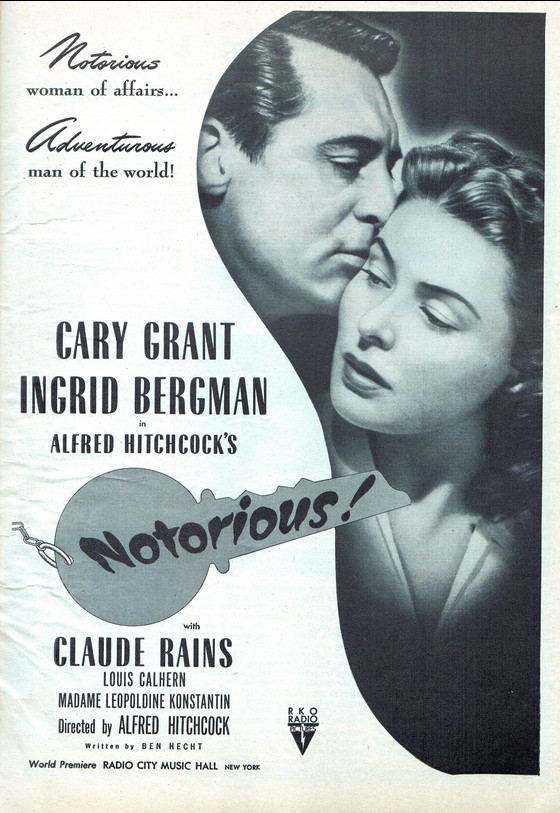 a poster for the movie, it shows an image of cary grant and ingrid bergman embracing