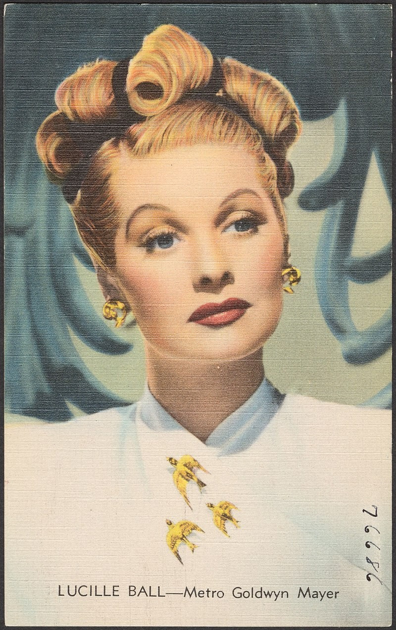 a postcard of actress lucille ball, her hair up, curled elegantly and gracefully, wearing a white stylish shirt with three gold bird broaches on the collar, a green floral abstract background, she is looking to the left of the viewer , she has large gold earrings and looks magnificent