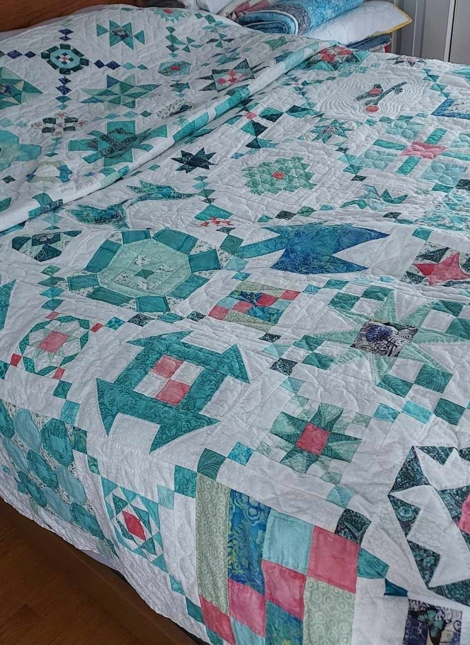 the quilt on a bed