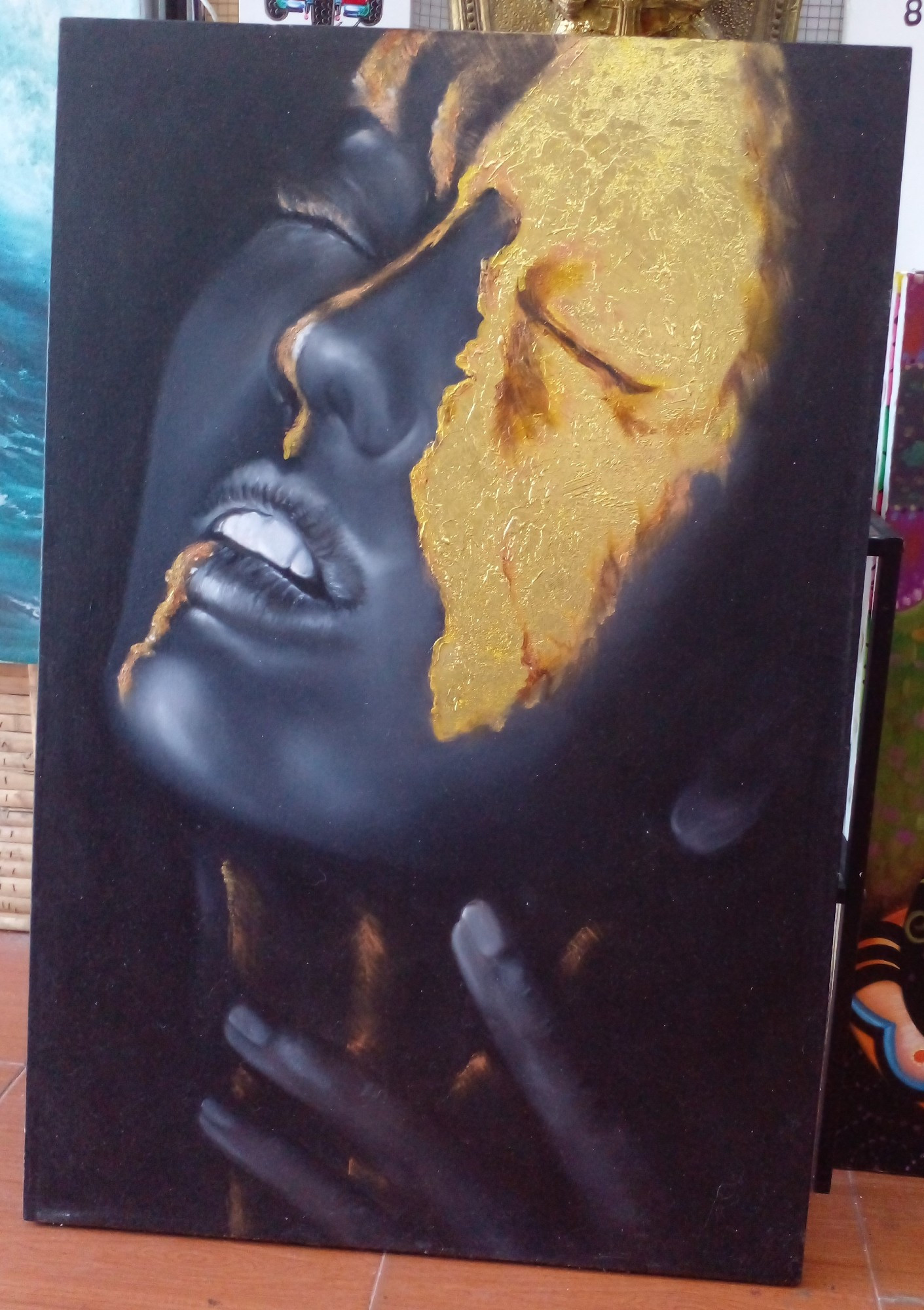 a painting of a woman, her skin a steel metal tone, gold covering her face and part of her cheek, gold line down the middle of her face, several gold lines on her throat , her fingertips touching her throat 