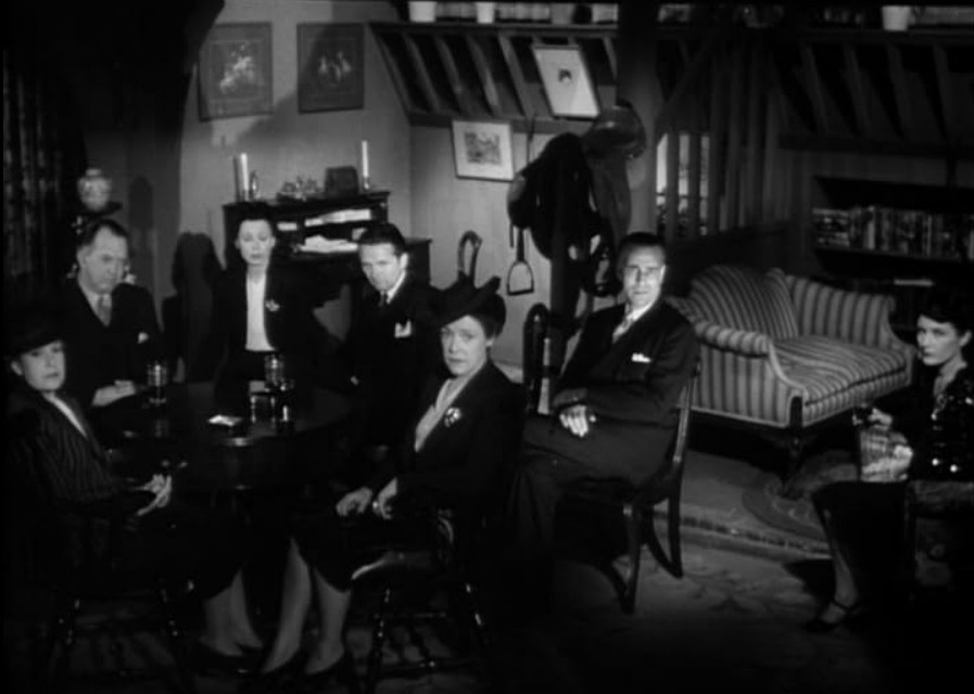 an image of members of a secret society in a meeting room, looking at the viewer