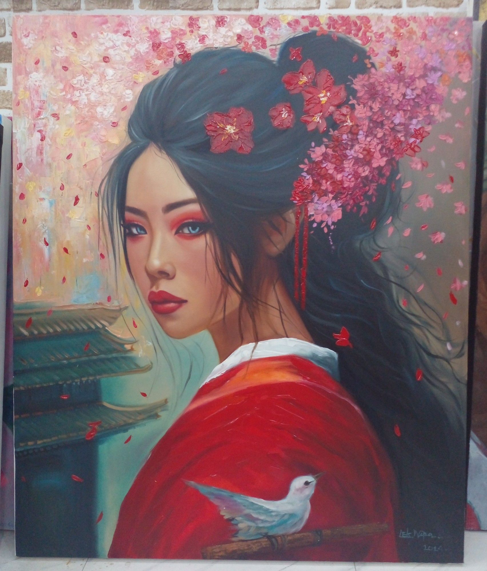 a woman seen from her chest up, a pink flowering branch curling through the painting, she is looking at the viewer, wearing a red kimono, her hair tied partially back, a section of a north eastern asian building in the background