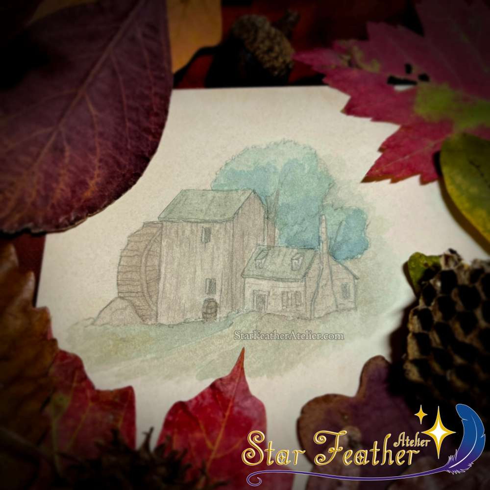 Photo of a small watercolor sketch featuring an old run down grist mill from the series Over the Garden Wall. The small painting is surrounded by various autumn leaves and natural decor.