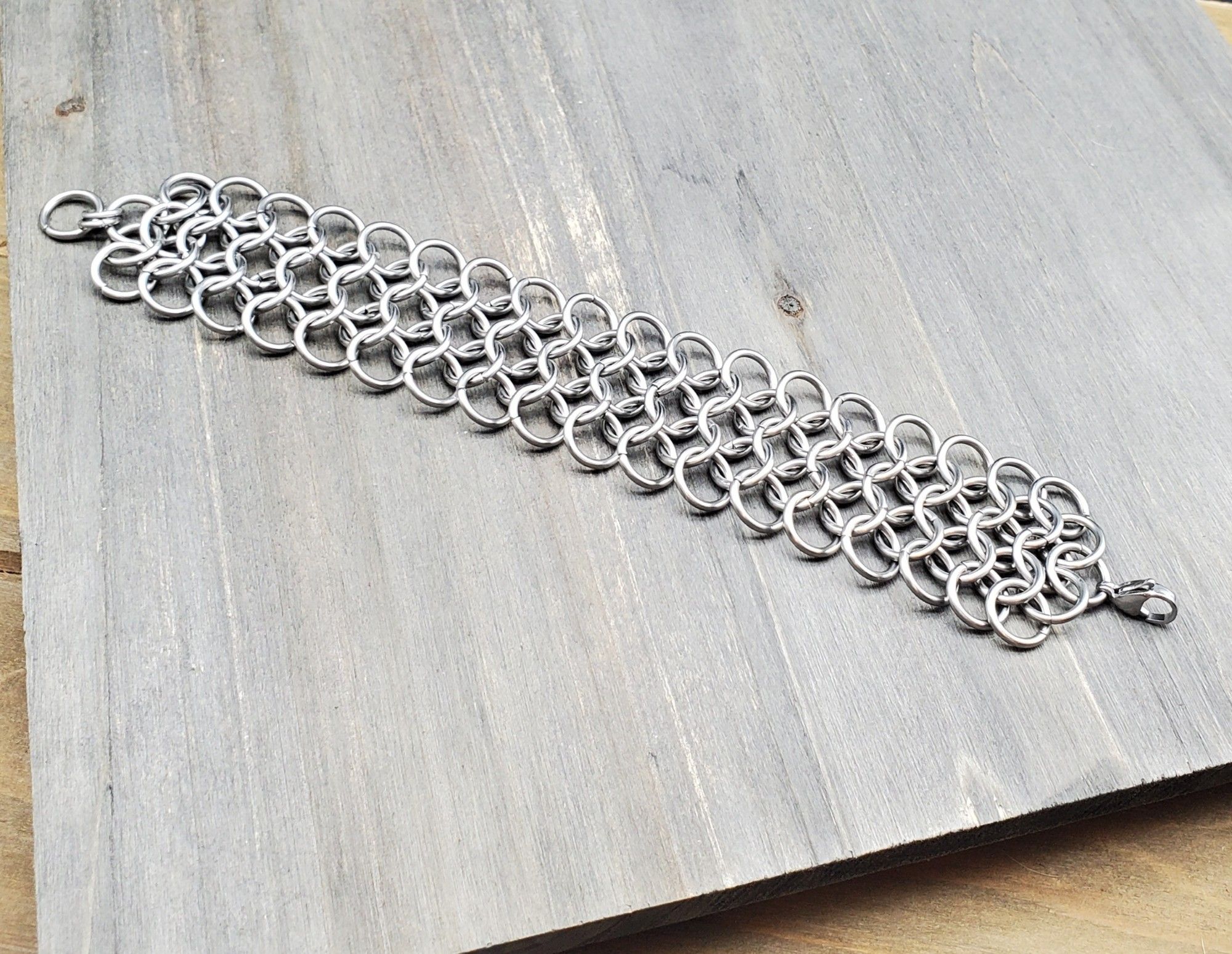 A thick stainless steel cuff style bracelet