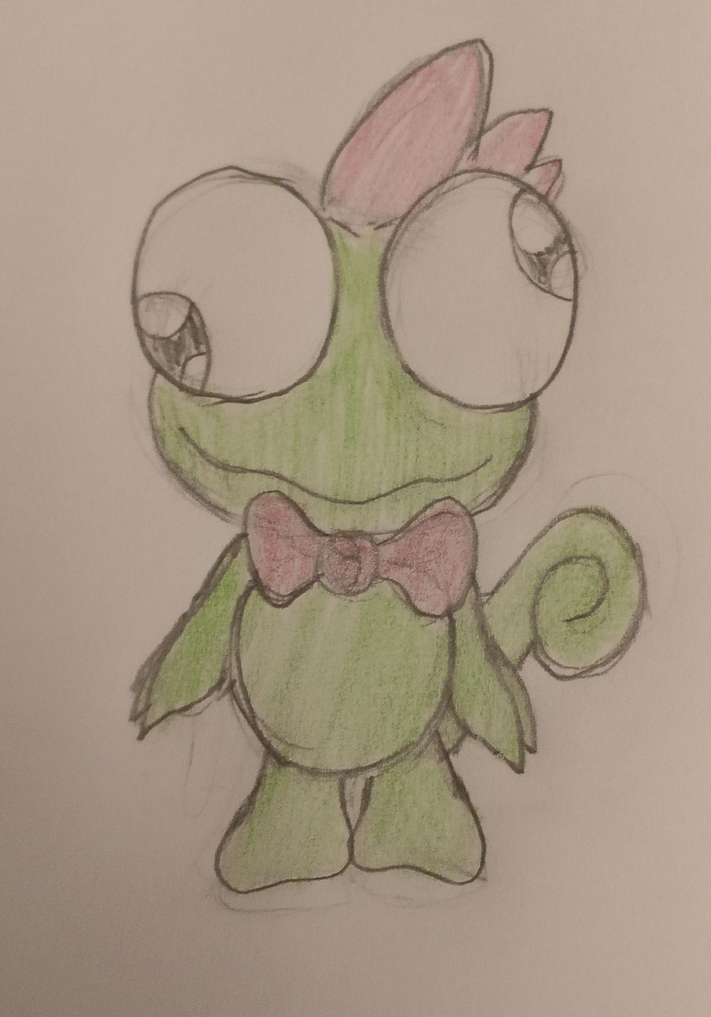 Knuffzilla a sanrio like frog with a bow.