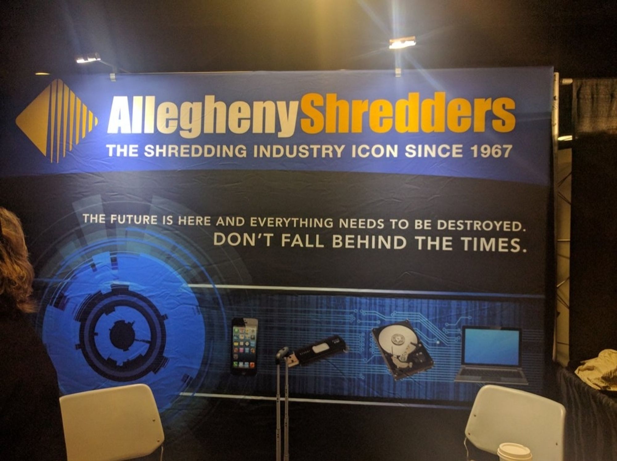 A sign for a company called Allegheny Shredders. Their slogan is apparently "The future is here and everything needs to be destroyed. Don't fall behind the times."