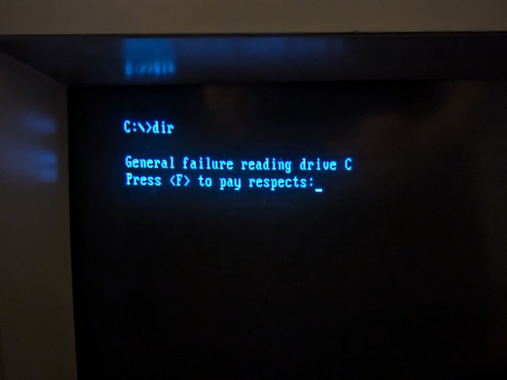 C:\>dir

General failure reading drive C
Press <F> to pay respects:_