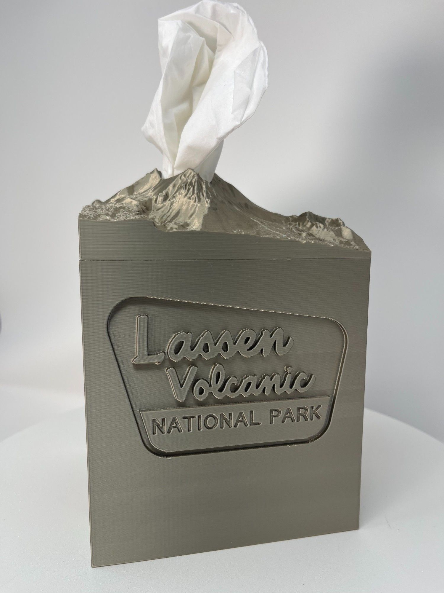 Cubic tissue box cover in the shape of Mt Lassen in Pyrite color.