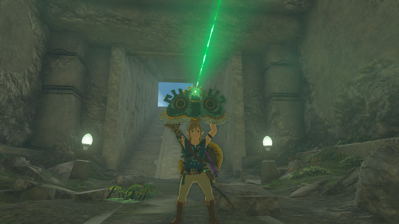 Link holds the spirit mask above his head with a light beam shooting out of it, in a pose resembling John Cusack from the 1989 film Say Anything