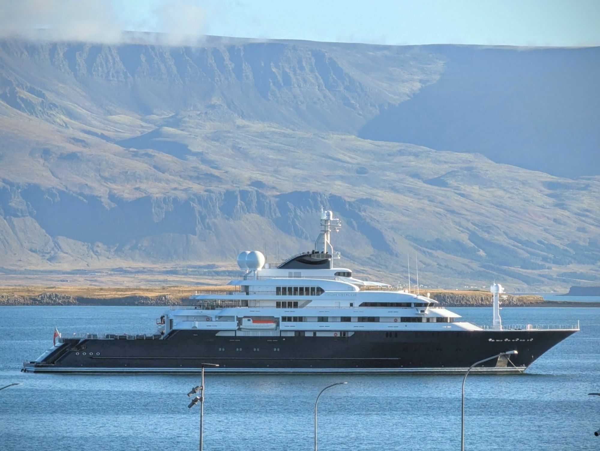 A closeup of the superyacht Octopus resting at anchor in Reykjavík