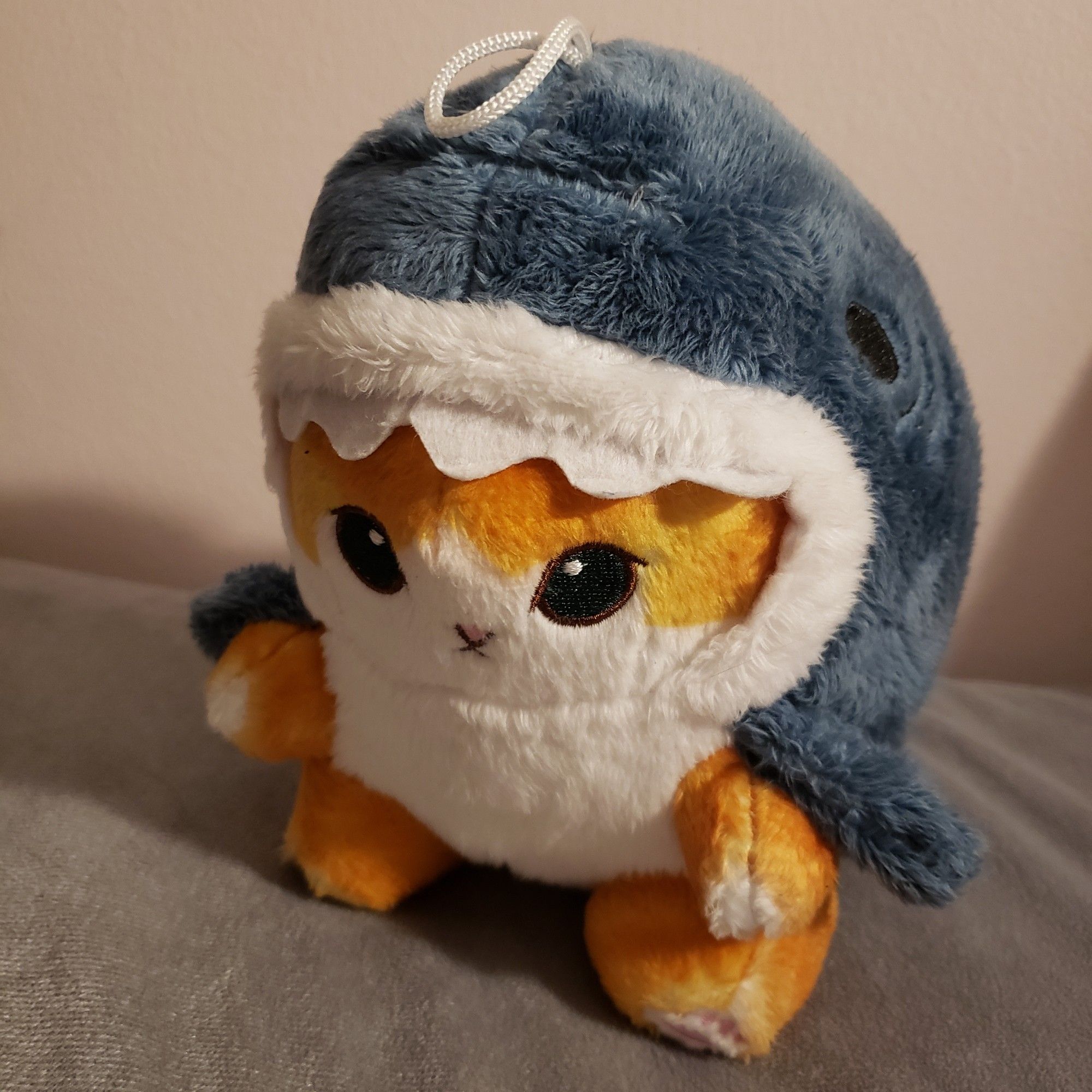 Orange cat with shark hoodie, all plush