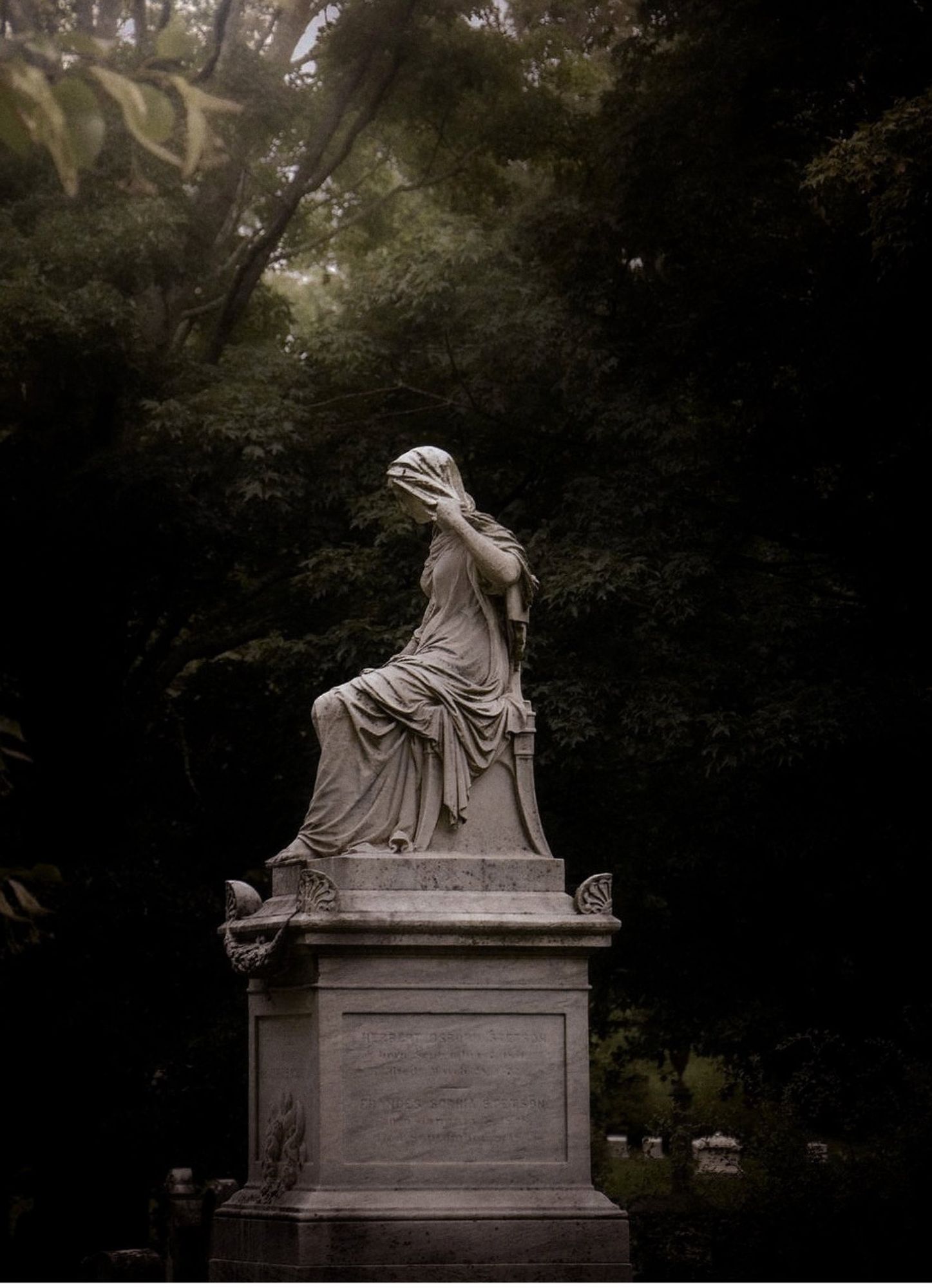 Reference 1- Sitting statue in the middle of a forest