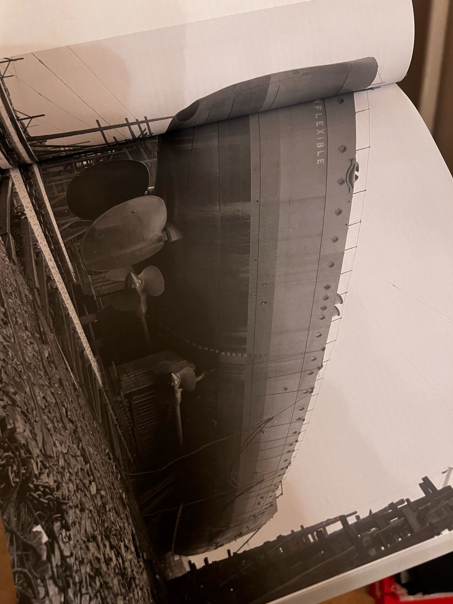 Photo from Clydebank Battlecruisers showing stern of HMS Inflexible under construction, with huge rudders and propellers