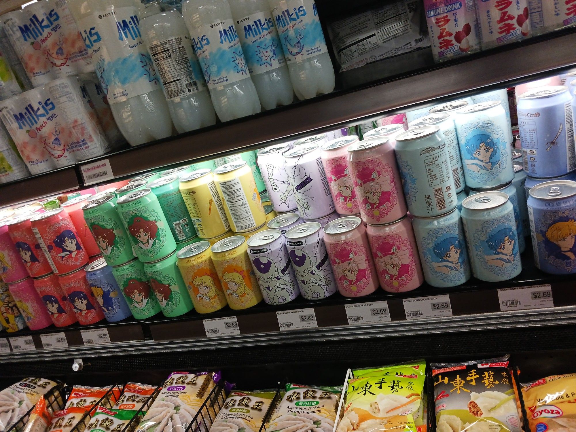 Cans of soda with the Sailor Scouts on them, but also there's a can with Freiza from DBZ on it in the middle.