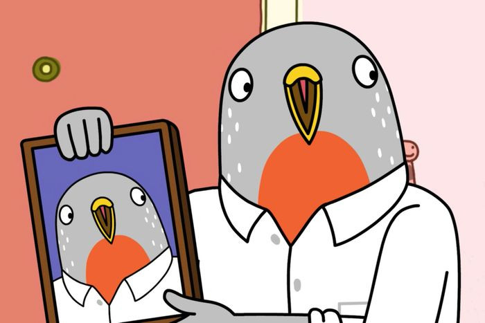 A screenshot from Tuca and Bertie. Speckle holds up a framed photo of himself with a goofy smile on his face, while making the same goofy smile.