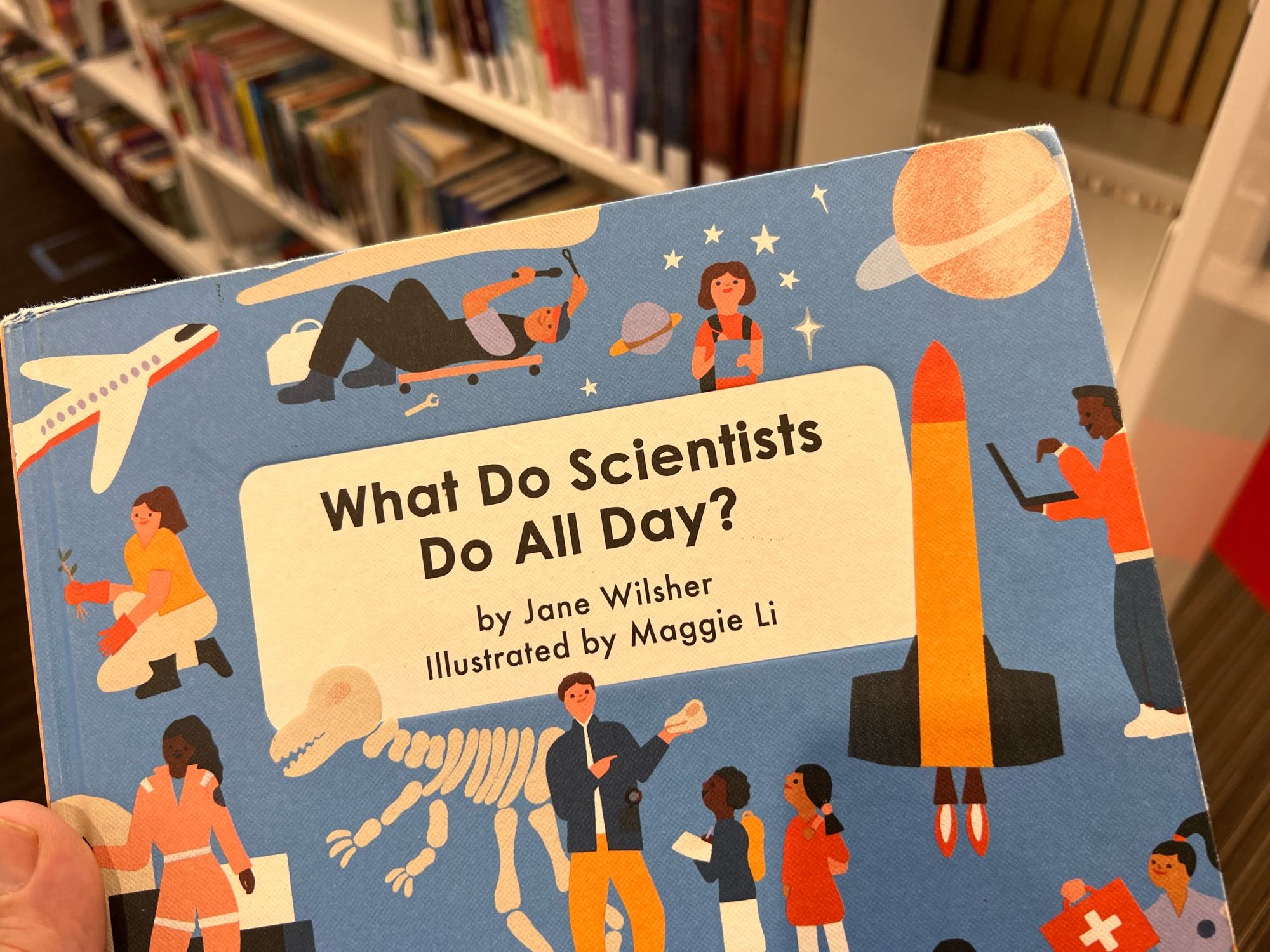 Photograph of children’s book cover “What do scientists do all day?”