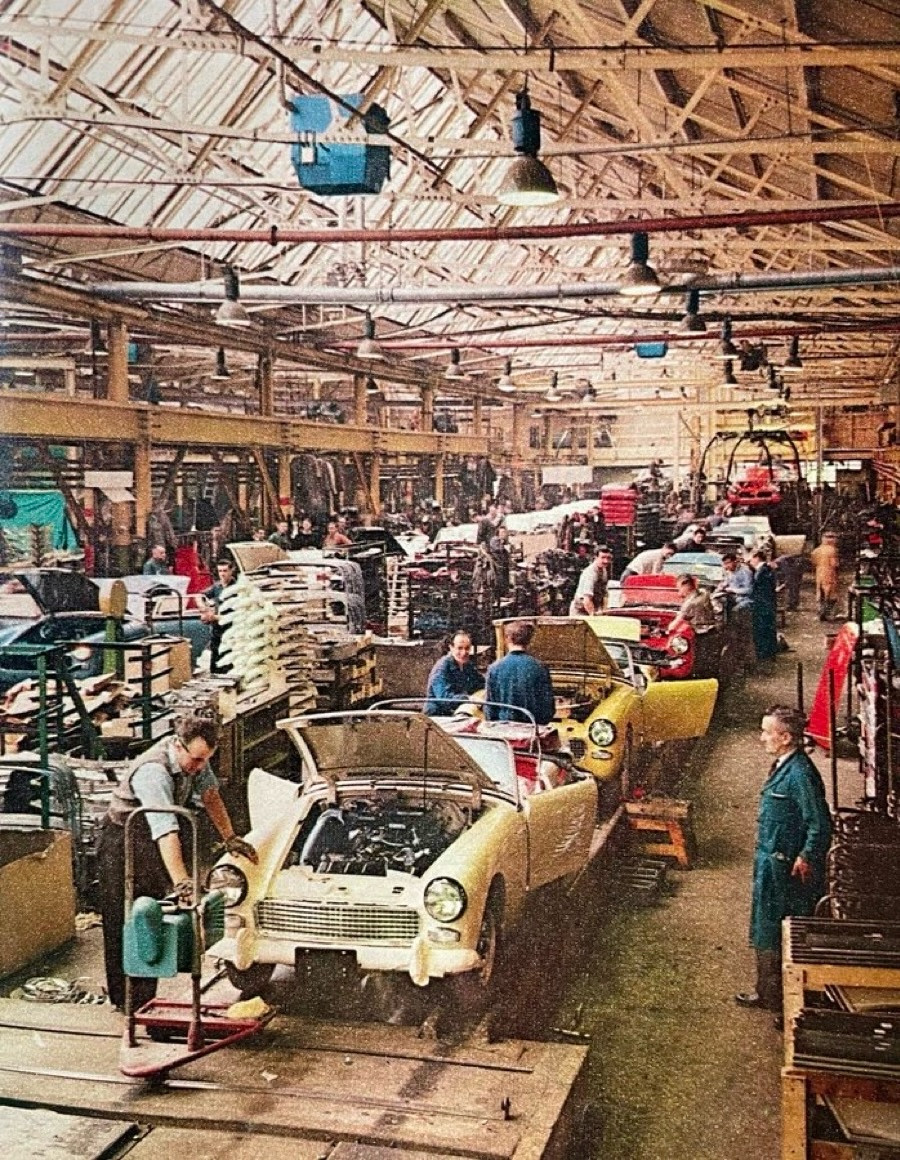 Photograph of a 1960s car factory production line