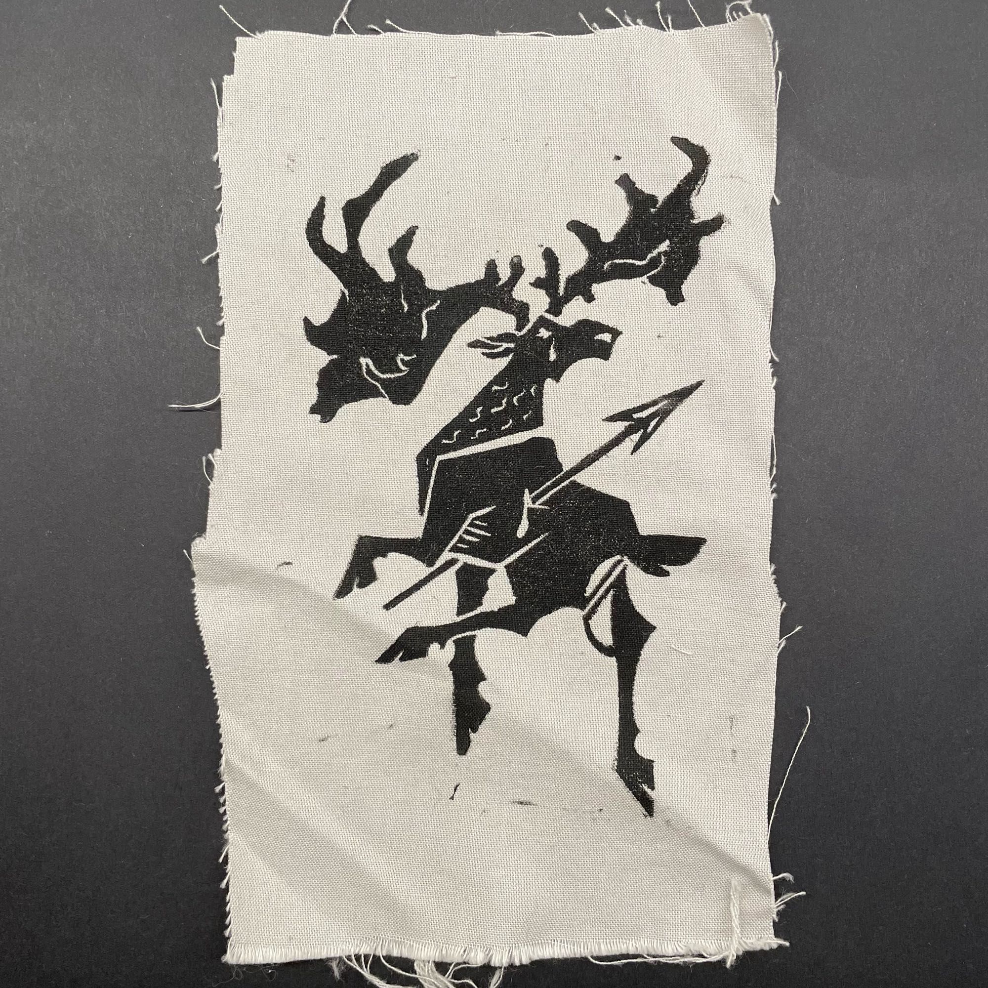 Black ink Irish elk print on light gray cotton