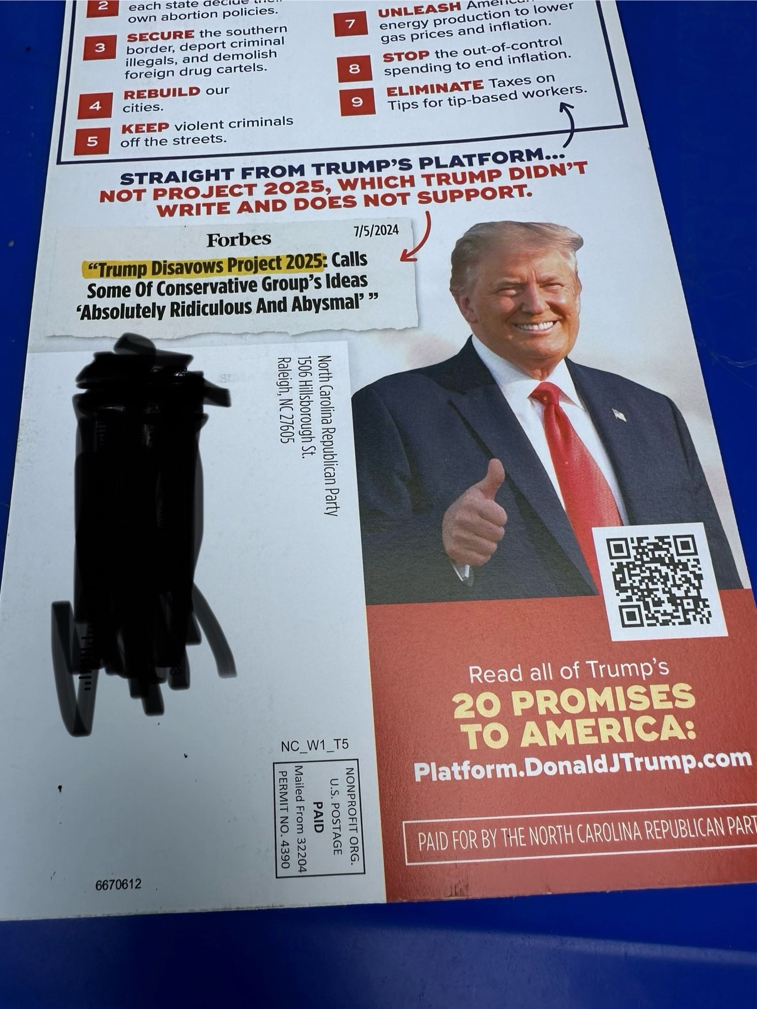 Photo of a pro-Trump flyer sent by the North Carolina Republican Party which points to ten policies and says “Straight from Trump’s platform, not Project 2025, which Trump didn’t write and does not support.”