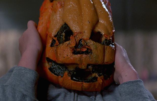 Buddy Kupfer struggles with his Silver Shamrock jack-o'-lantern Halloween mask in a scene from Halloween III: Season of the Witch