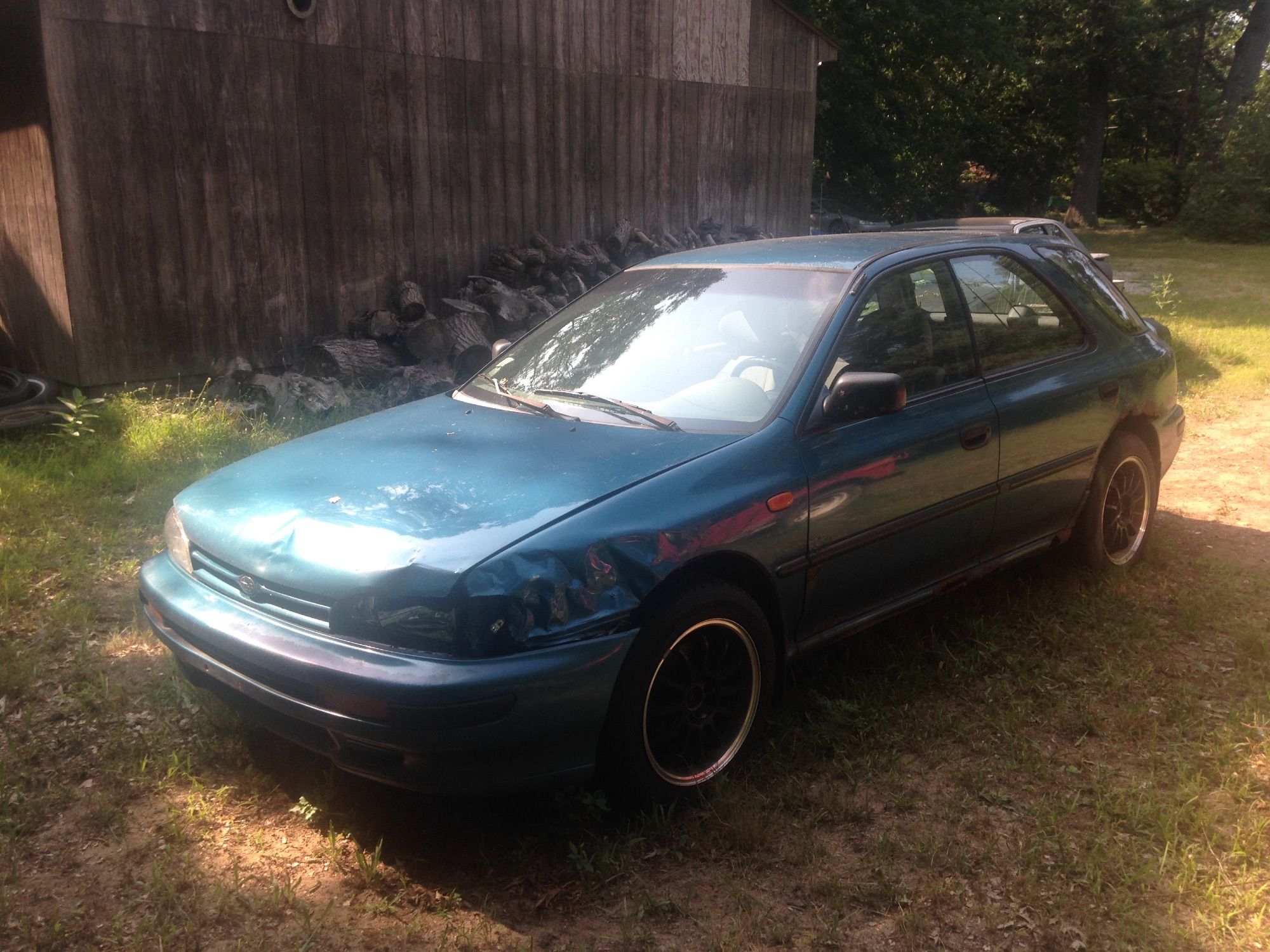 My old impreza wagon that guy is nose broken by a suicidal deer