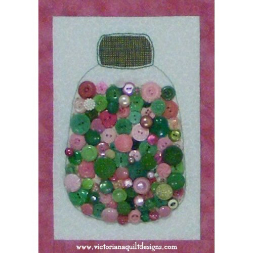 Button jar quilt block, filled with real green and pink buttons.