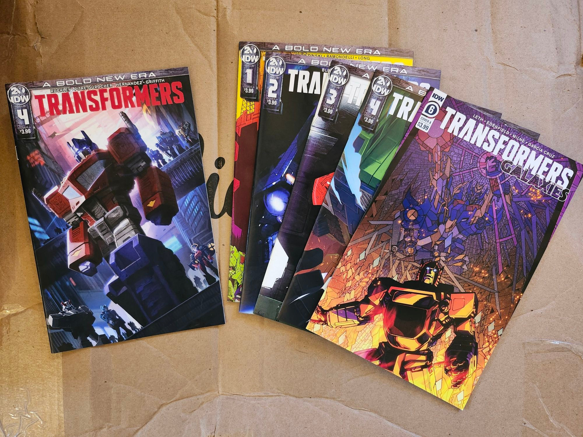 Transformers comics from the IDW2 run. #4 of the main series, and 1-4 + 6 of Galaxies