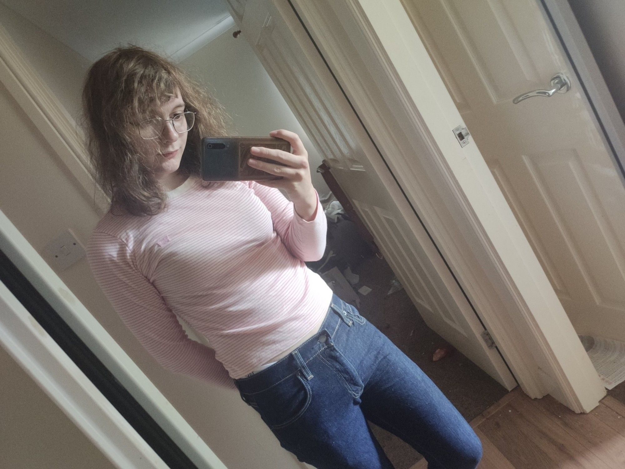 photo of me in blue jeans and a pink t-shirt