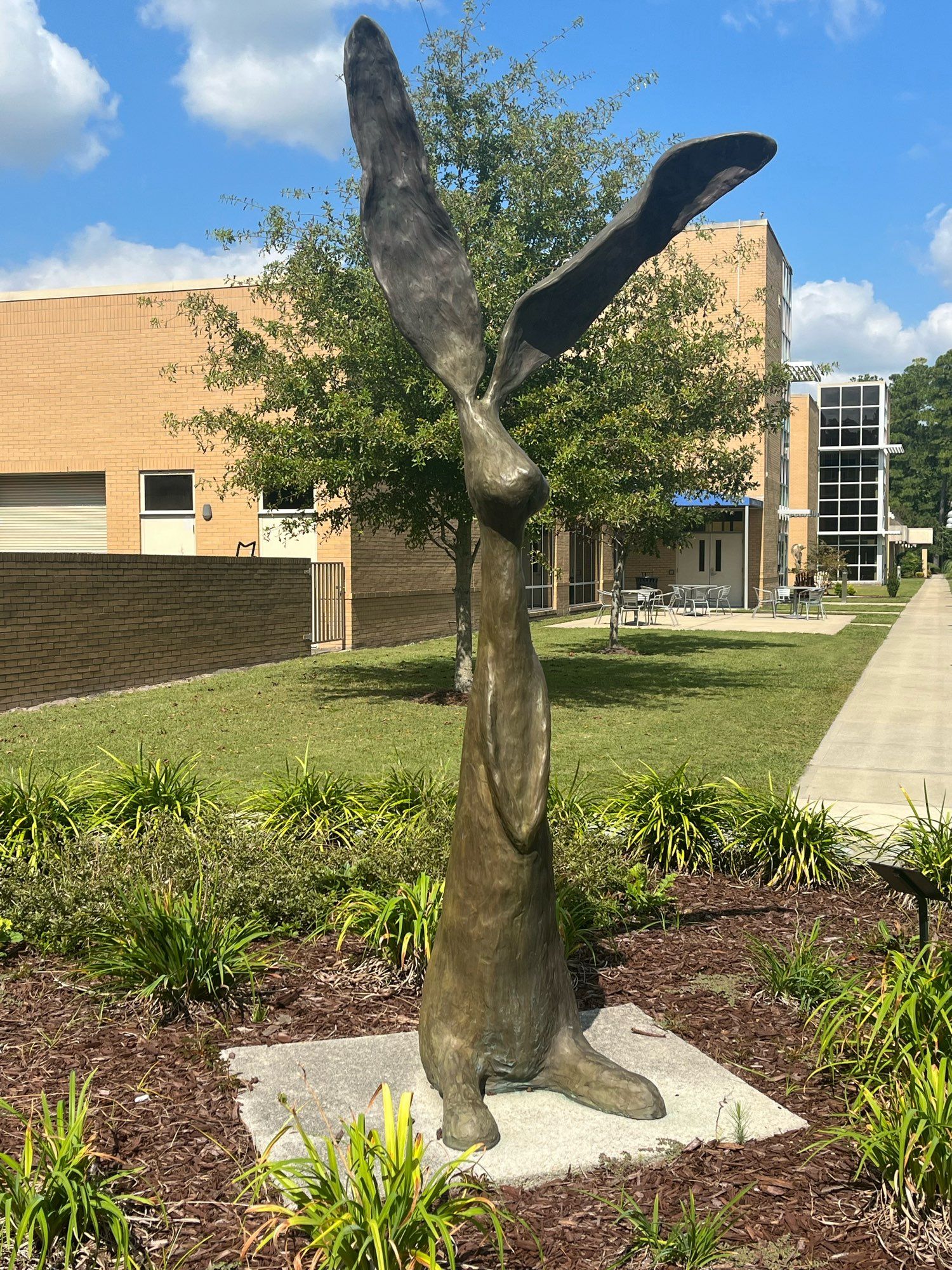 a statue of a rabbit with large ears