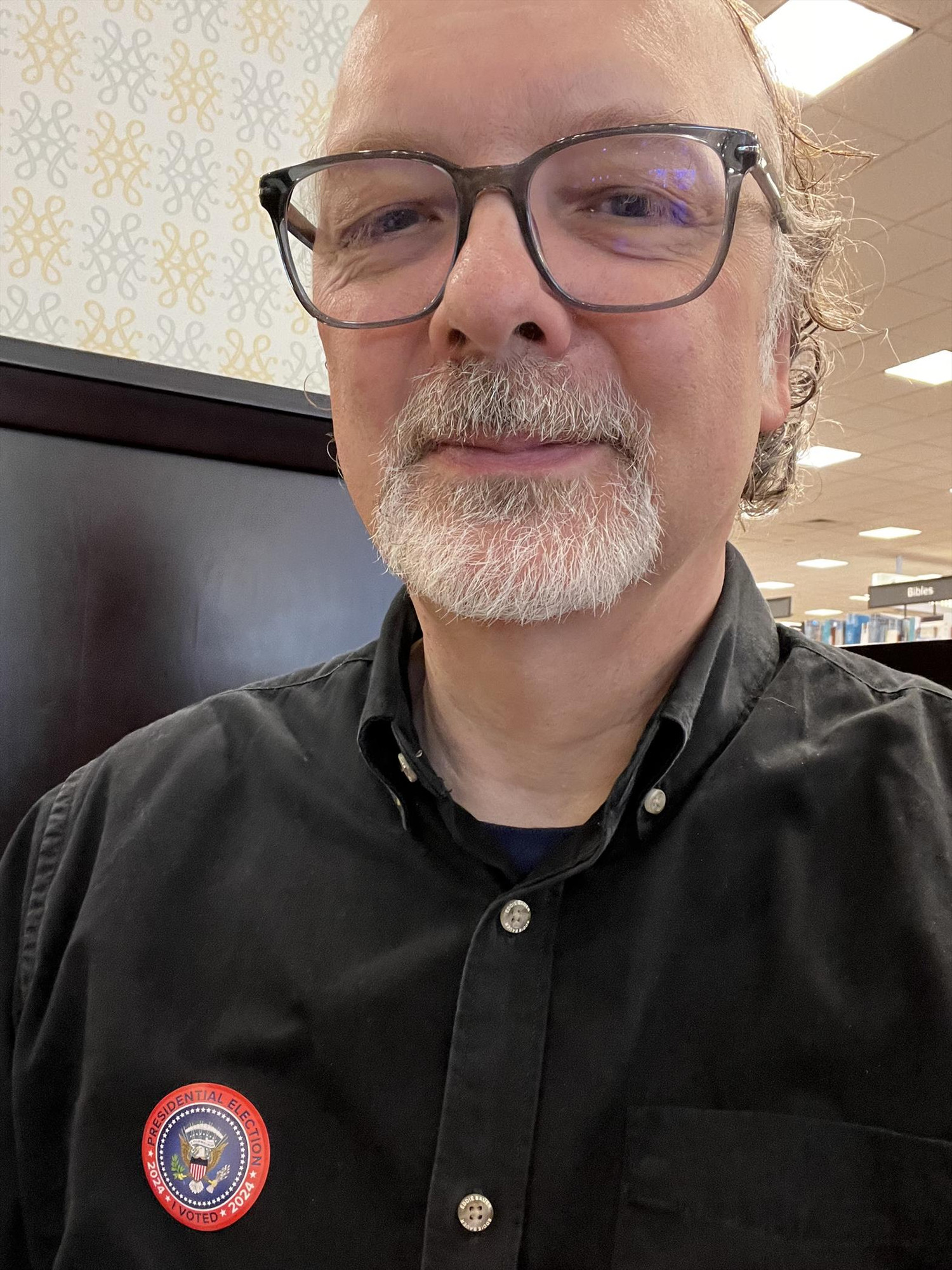 Sid with voting U.S. Presidential Election sticker on shirt