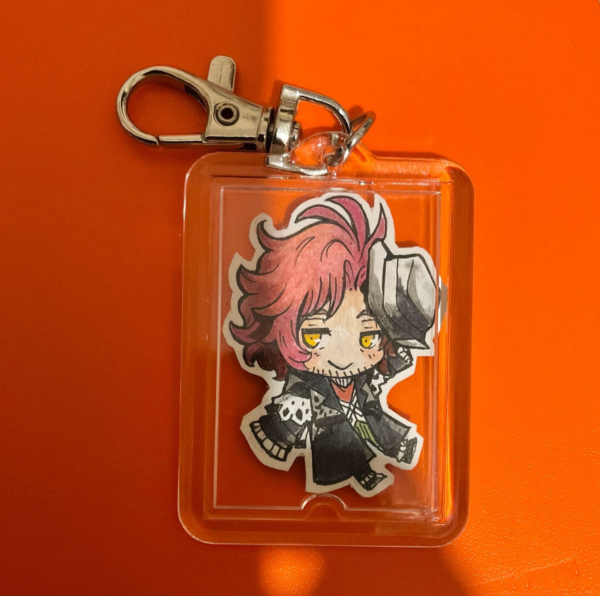 Hand-drawn keychain of Ardyn done with Copic Multiliner and Copic Markers (Front side)