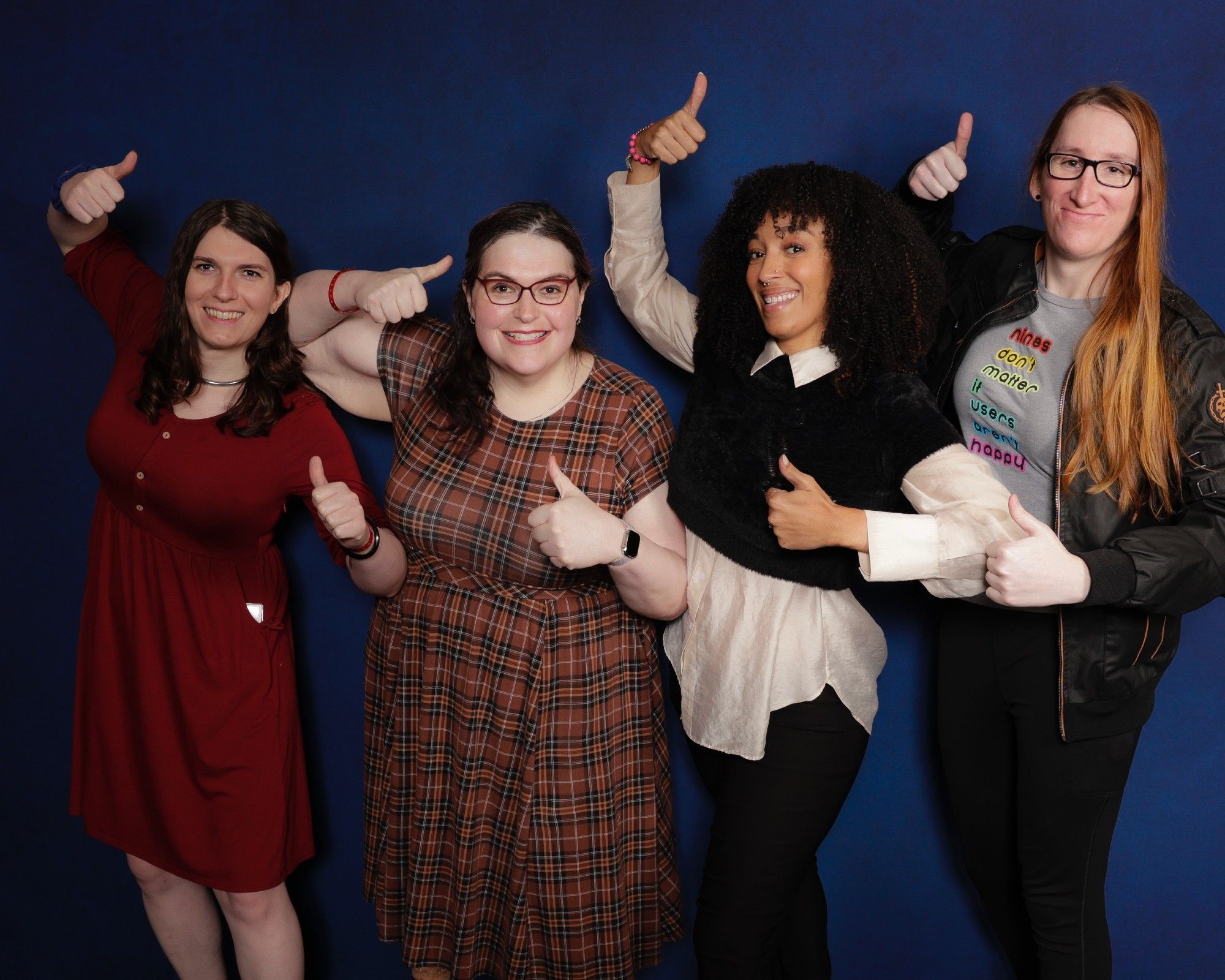 Mary, Terra, Tawny Newsome, and Morgan doing Tawny's wonderfully awkward thumbs up pose from Strange New Worlds S2E8.