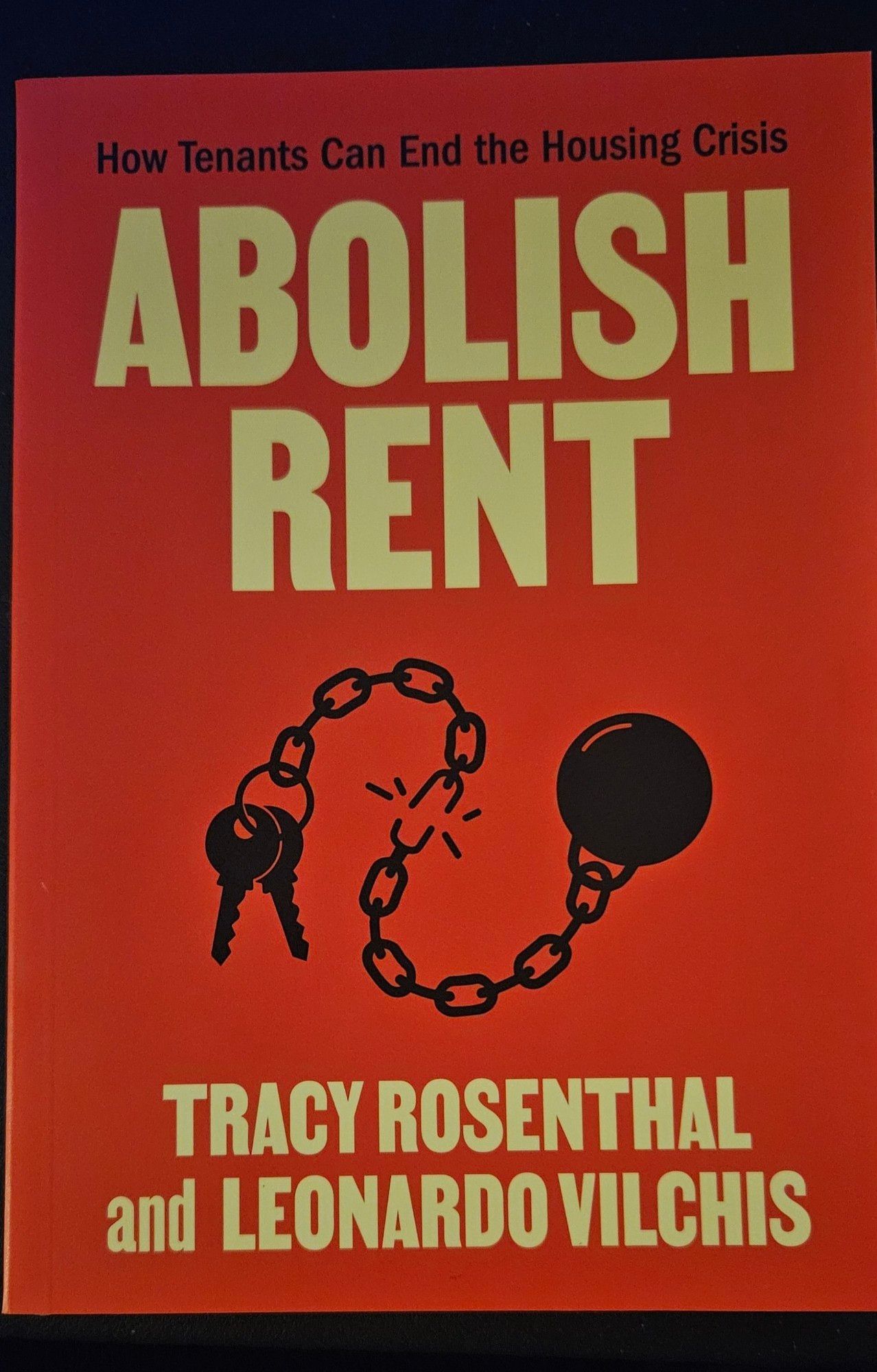 Abolish Rent: How Tenants Can End the Housing Crisis by Tracy Rosenthal and Leonardo Vilchis.

Picture depicts a ball and chain with keys on the opposite end of the ball and the chain link in the middle snapping on a maroon backdrop.