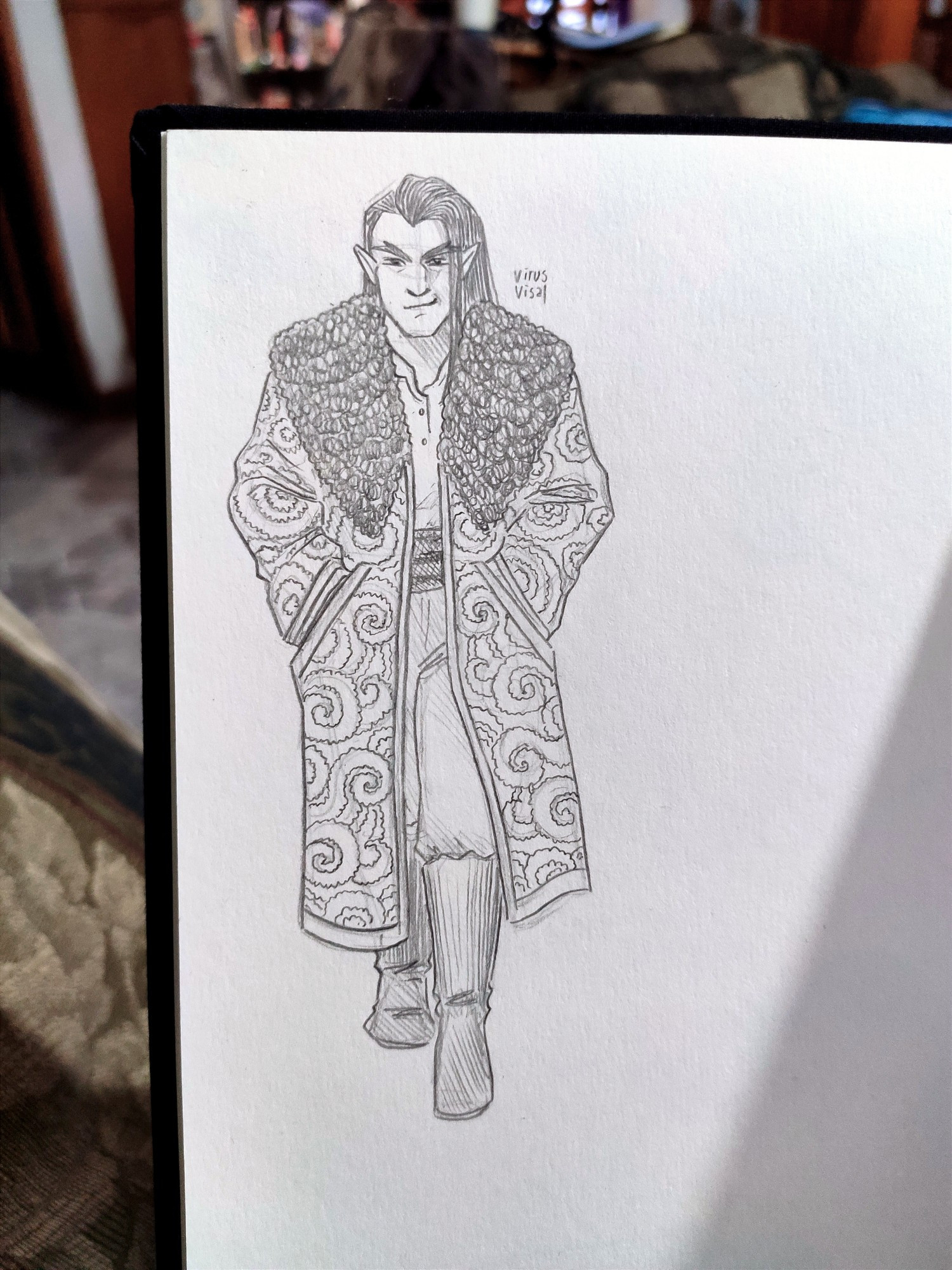 Strahd von Zarovich walking towards you. He looks very fashionable wearing a long patterned cloak with fur on the collar.