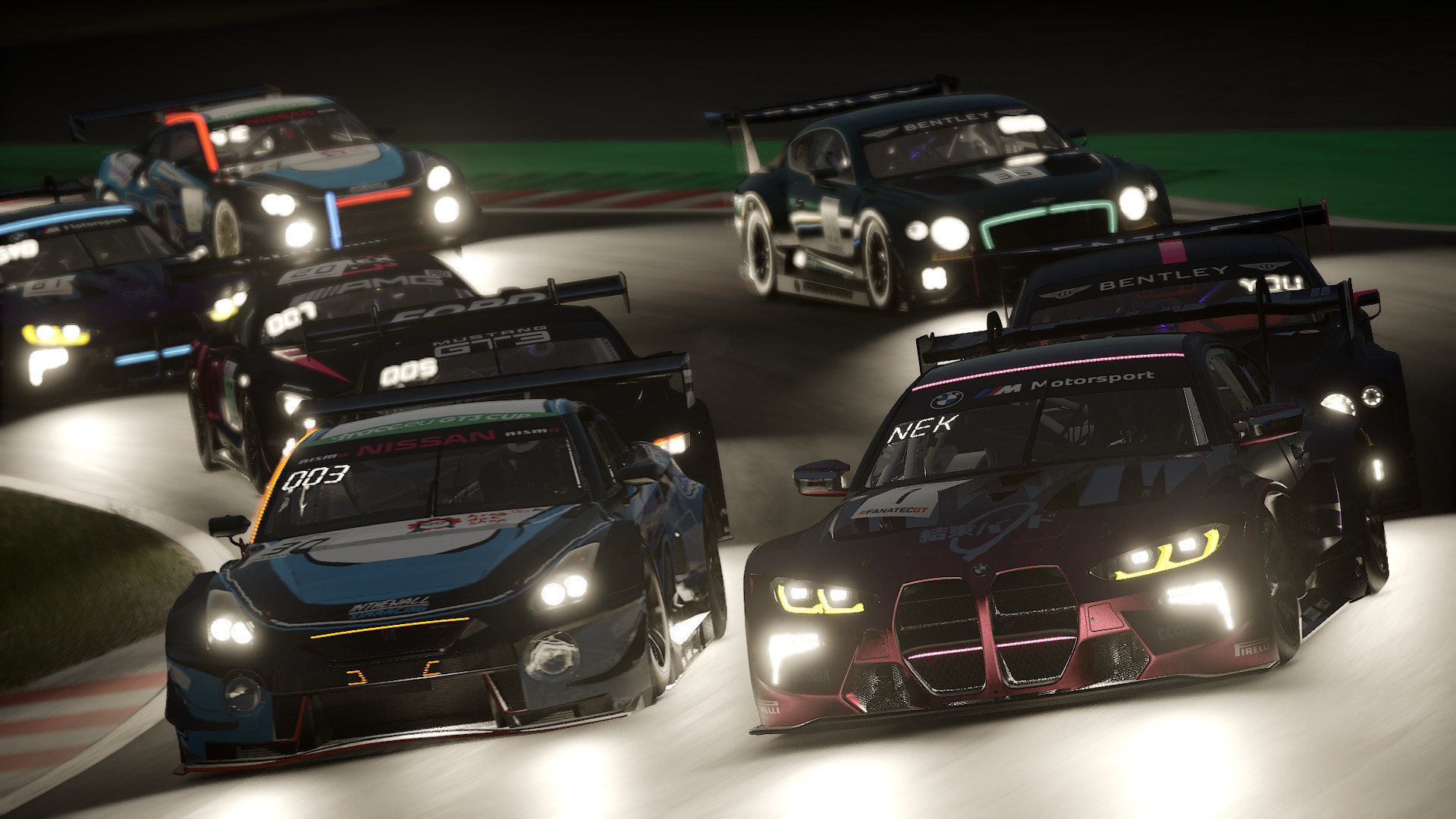 A pack of racing cars go around turn 2 of Suzuka at night, with their headlights on. The right frontmost car is a BMW M4 GT3 in purple and silver with the #1 numberplate. The driver is Ruby Nekomata. Next to the BMW is a Nissan GT-R GT3 in black, blue and white. It is piloted by Yuanxi Lin with the number #30 on it. There are six more cars behind the pair, including two Bentley Continental GT3s, a Mustang GT3, a Mercedes AMG GT3 and another BMW M4 GT3. 