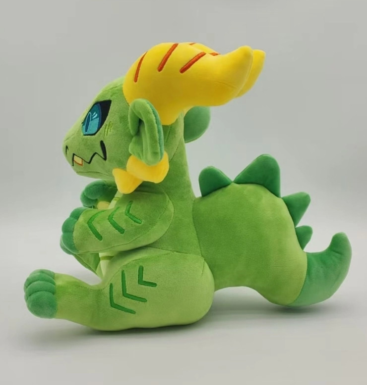 Green kobold plush in profile