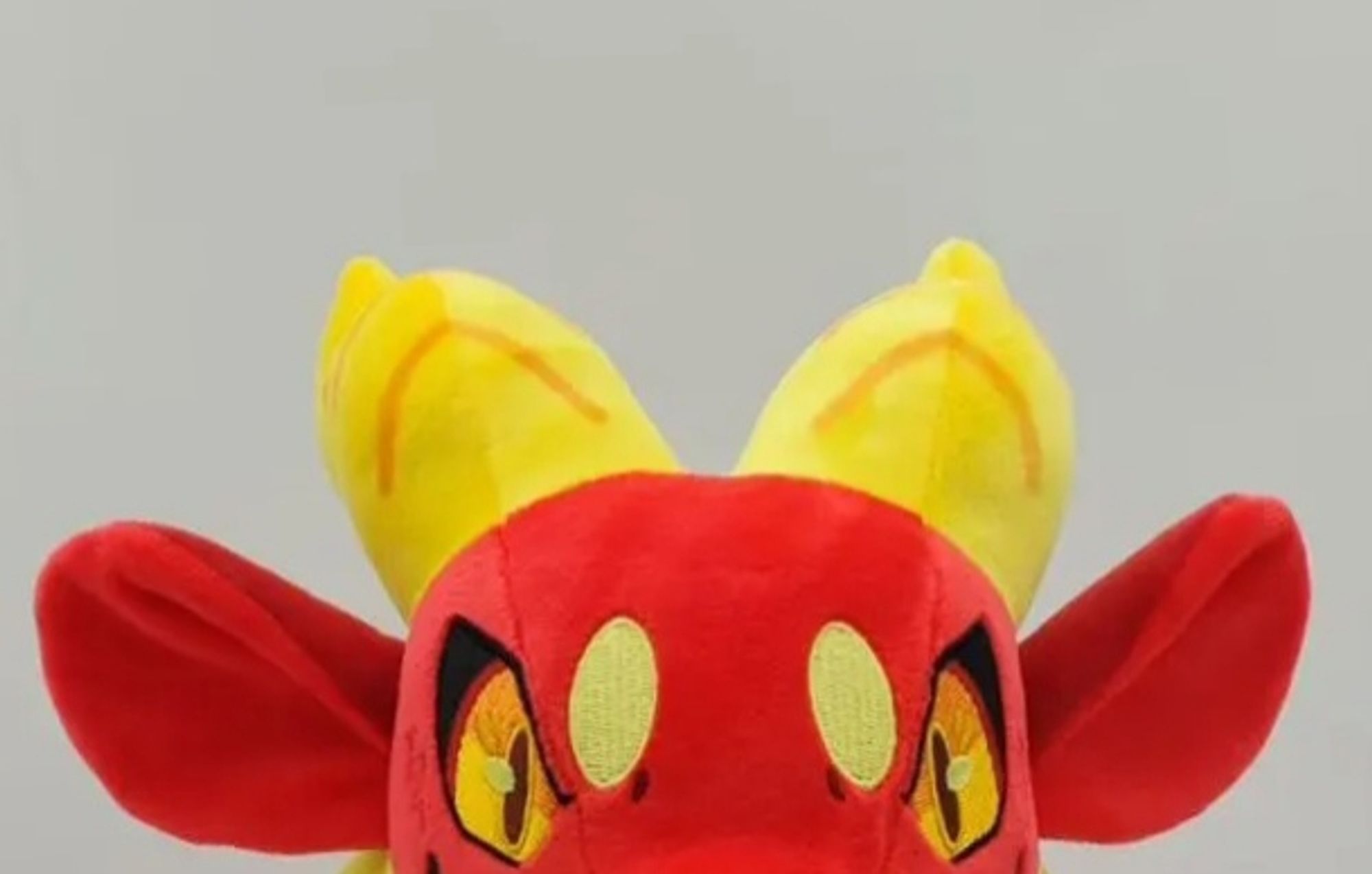 small plush bastard peeking at your pickable pockets