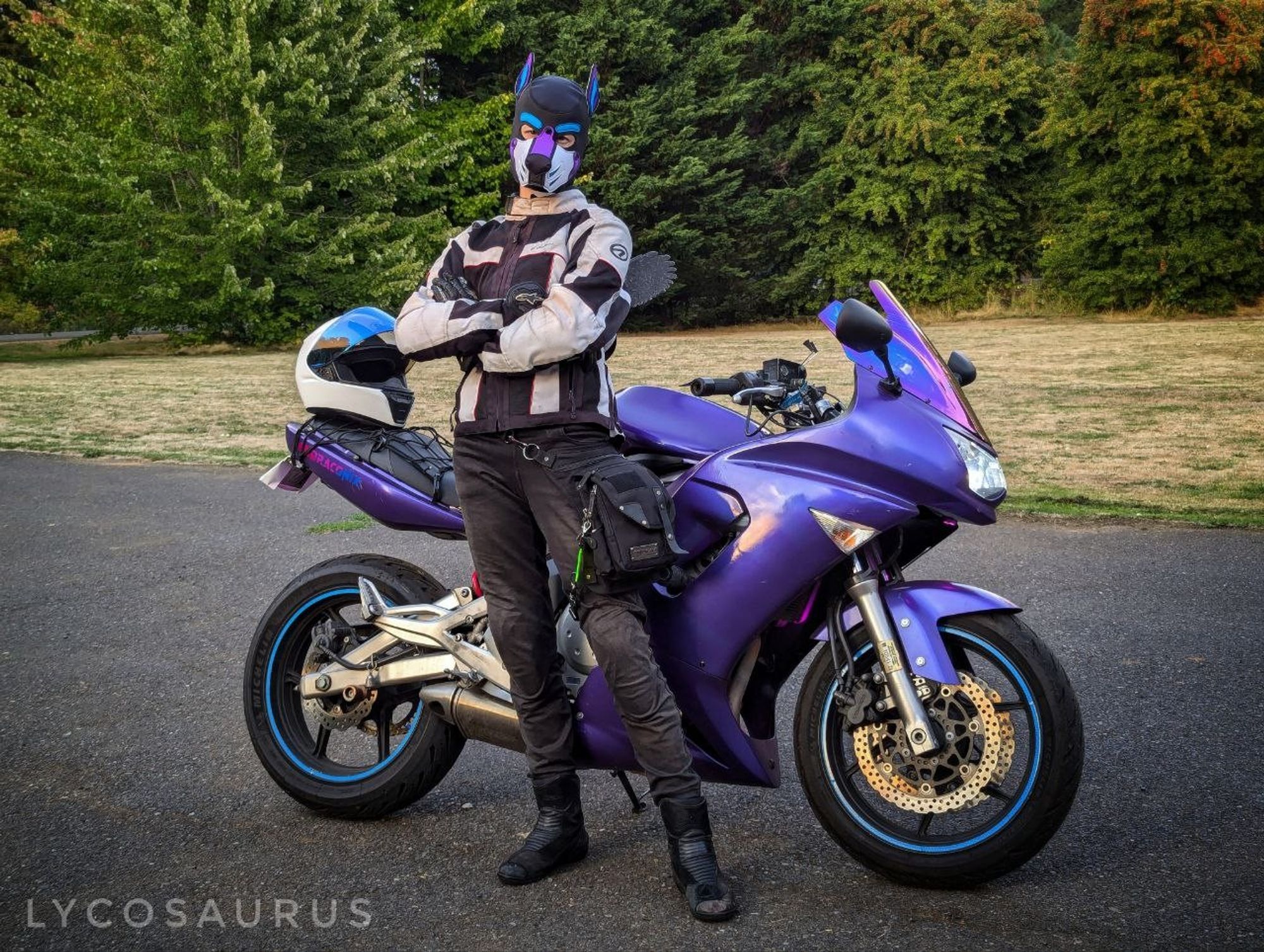 Posing in pup gear with my motorcycle