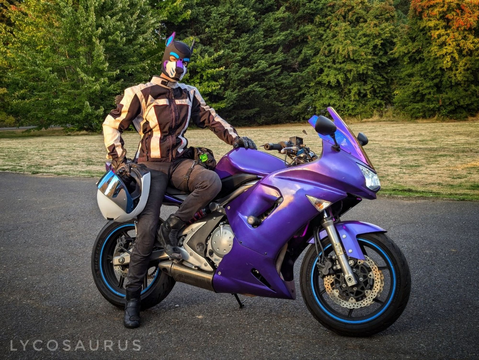 Posing in pup gear with my motorcycle