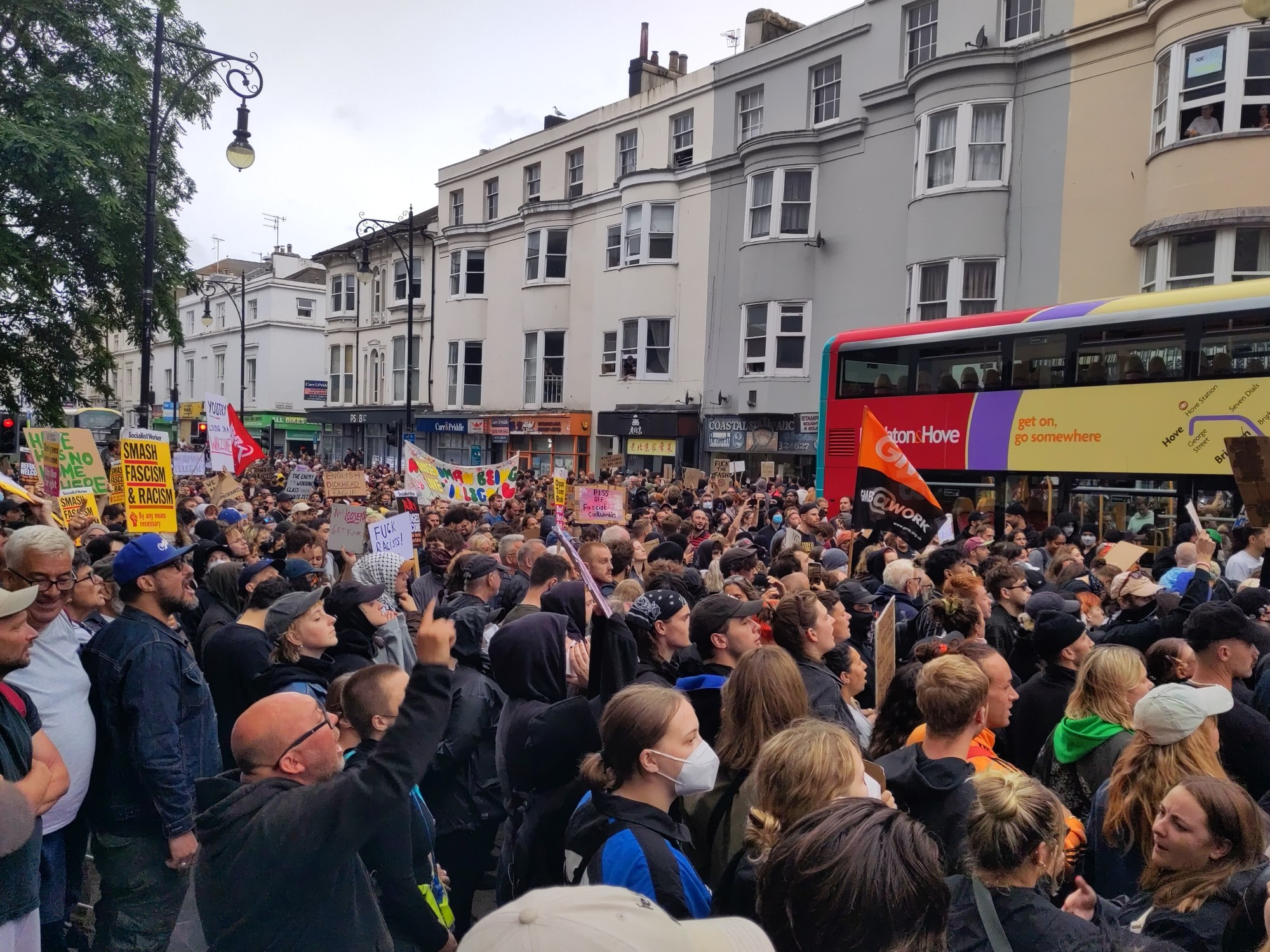 A big colourful anti-fascist demo in Brighton.