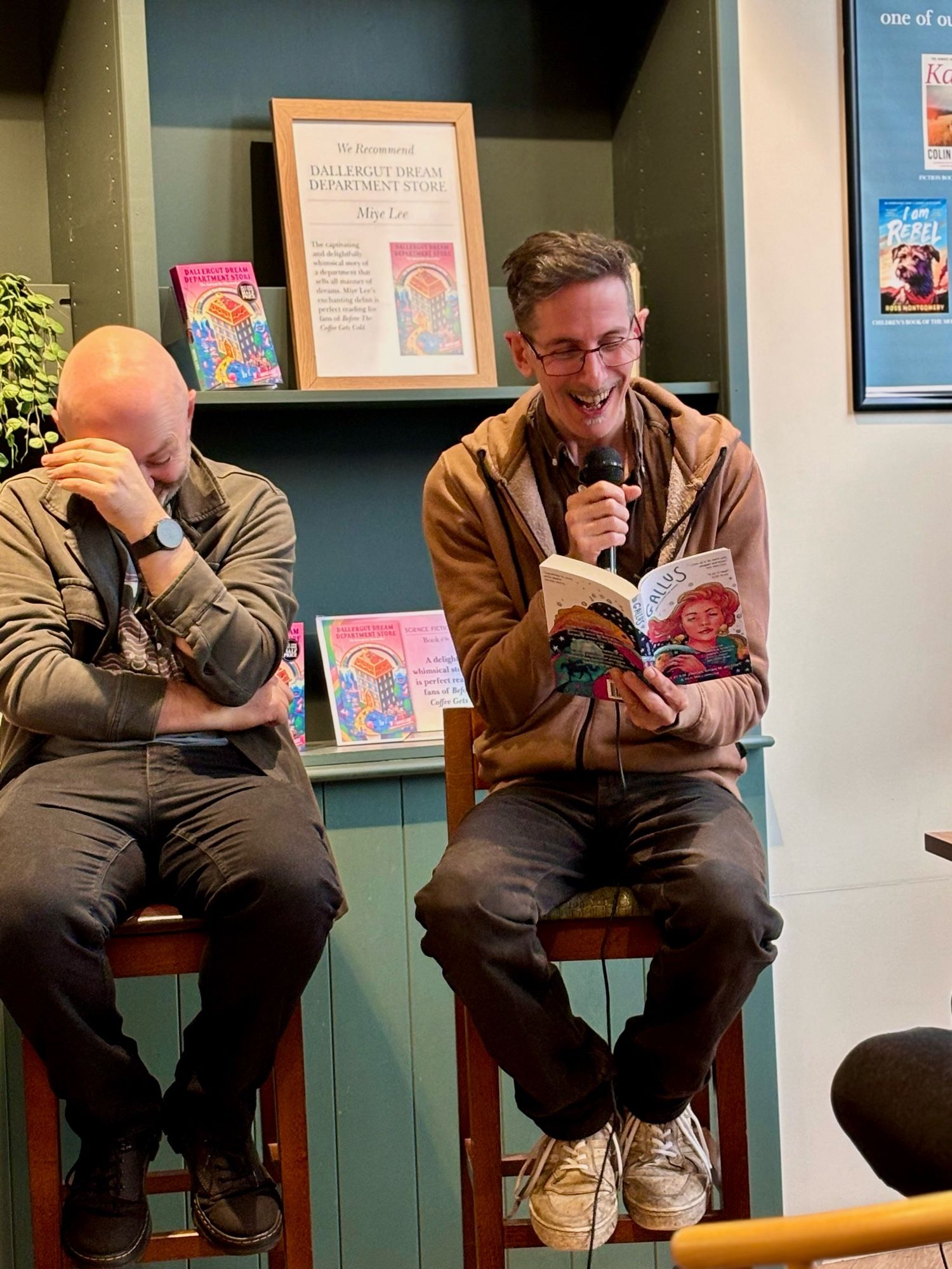 Hal Duncan reading from his short story, sitting next to Neil Williamson