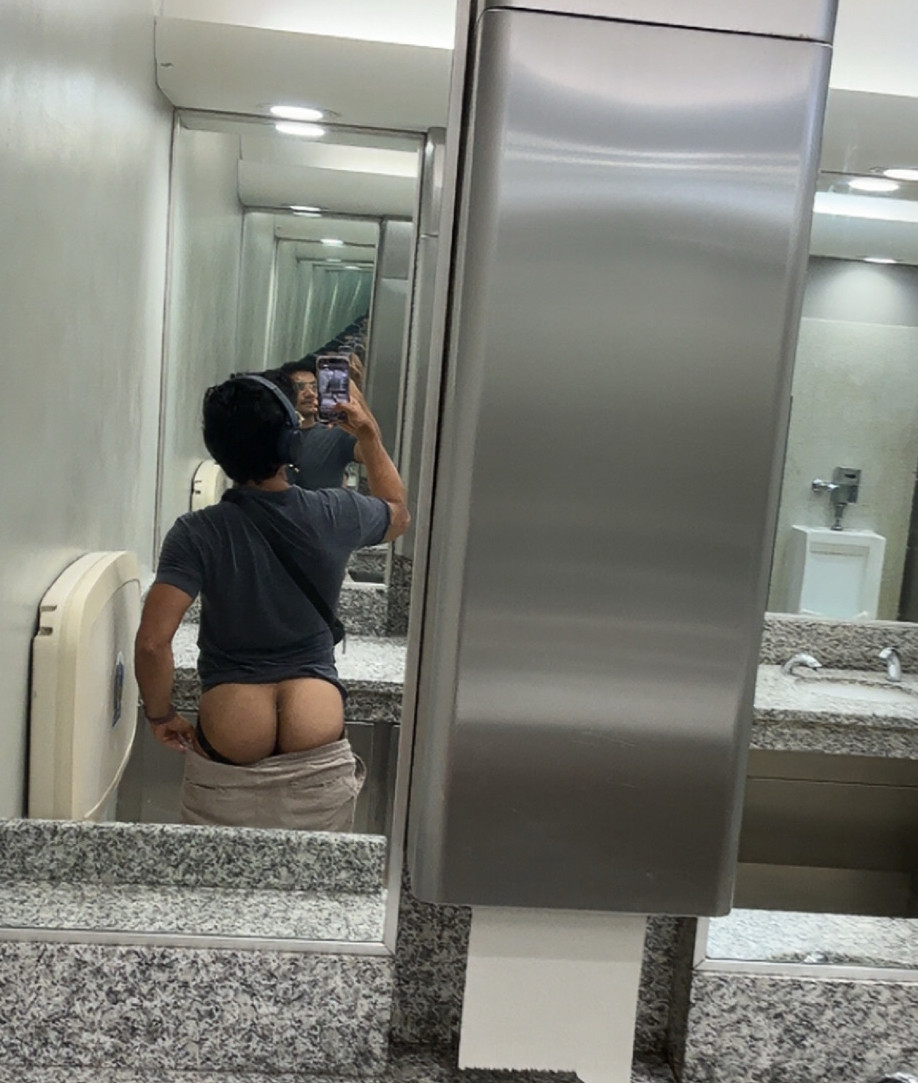 a slut in public airport restroom 