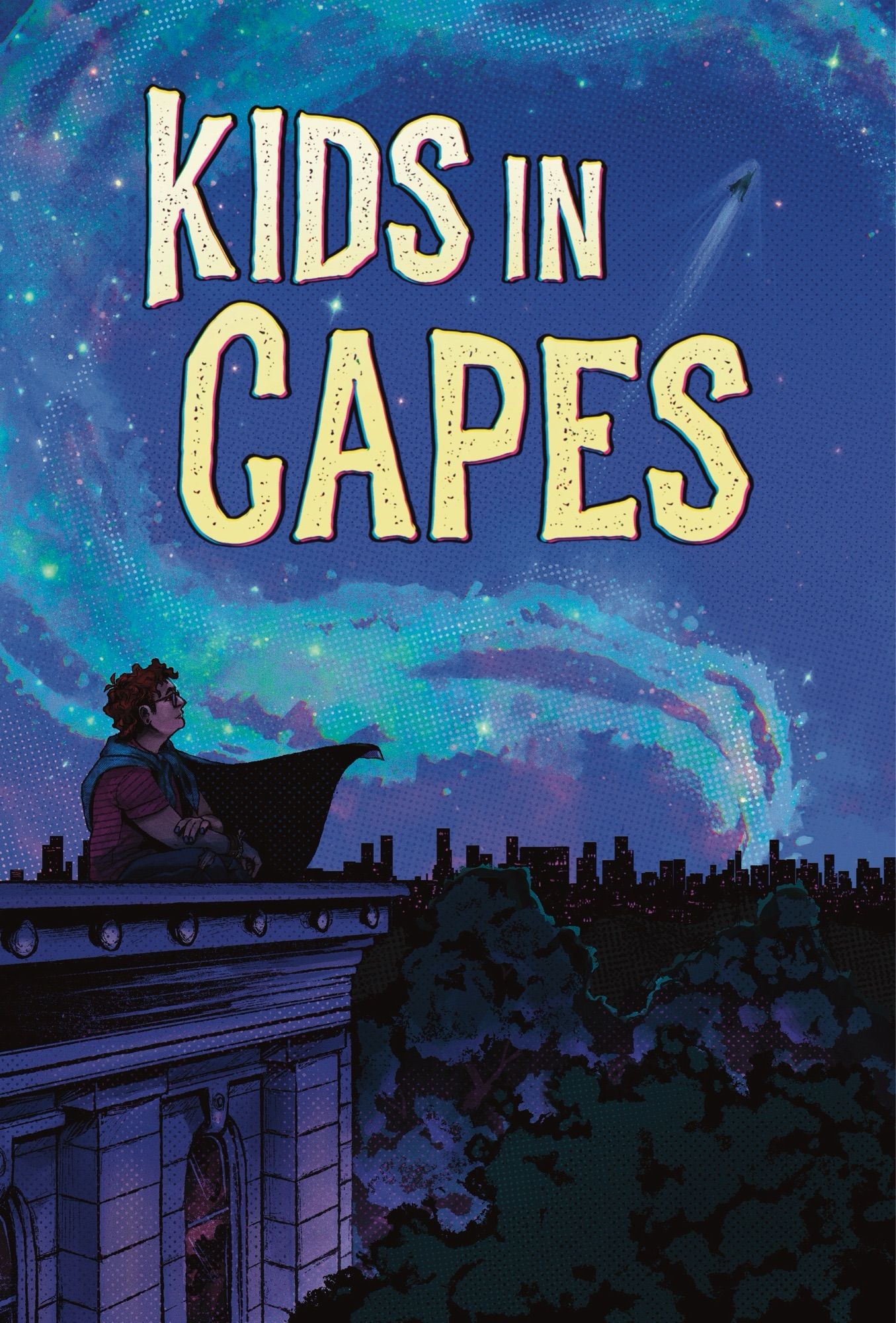 Cover art. An androgynous fat teenager wearing a striped t shirt and ripped jeans sits cross-legged on the roof of a neoclassical stone building, gazing up at the night sky reflected in their glasses lenses. The teen's blue buffalo plaid cape blows to the right where, distantly on the horizon, a city skyline twinkles, made small under the vastness of the blue-purple sky that takes up two thirds of the composition. A brilliant galaxy curves upwards from the horizon, dotted with twinkling stars and halftone textures. A small silhouetted caped figure flies upwards from the city, blue light trailing behind them, akin to a shooting star. The title "Kids in Capes' sits nestled in the curve of the galaxy.