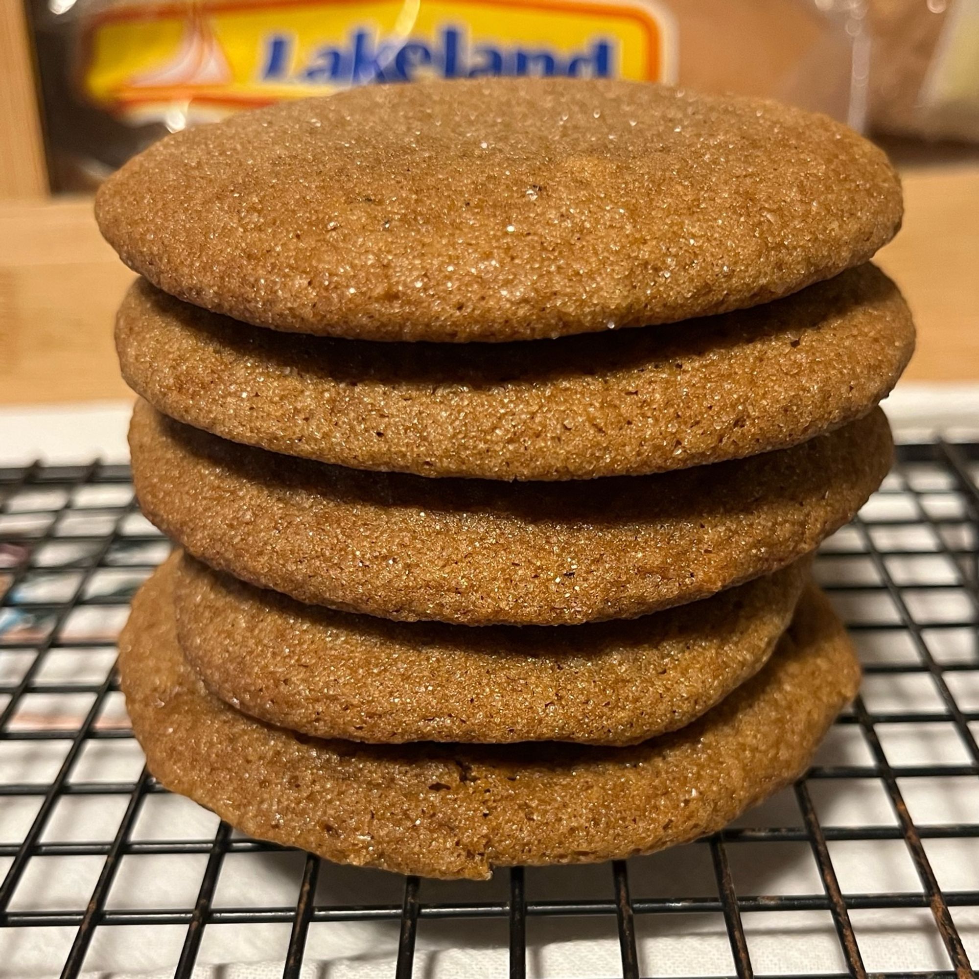 Five molasses cookies stacked on top of each other