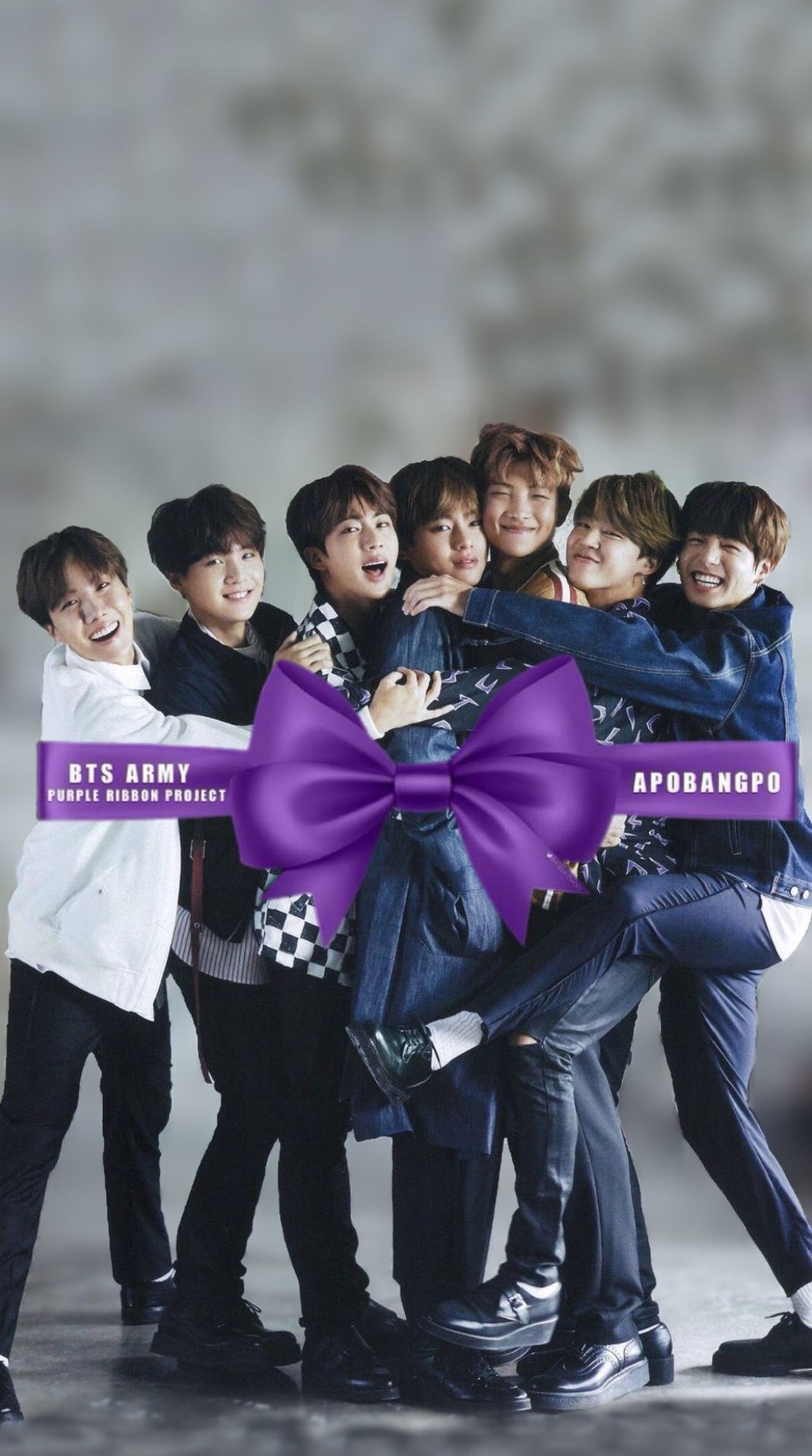 BTS members and the purple ribbon across them...