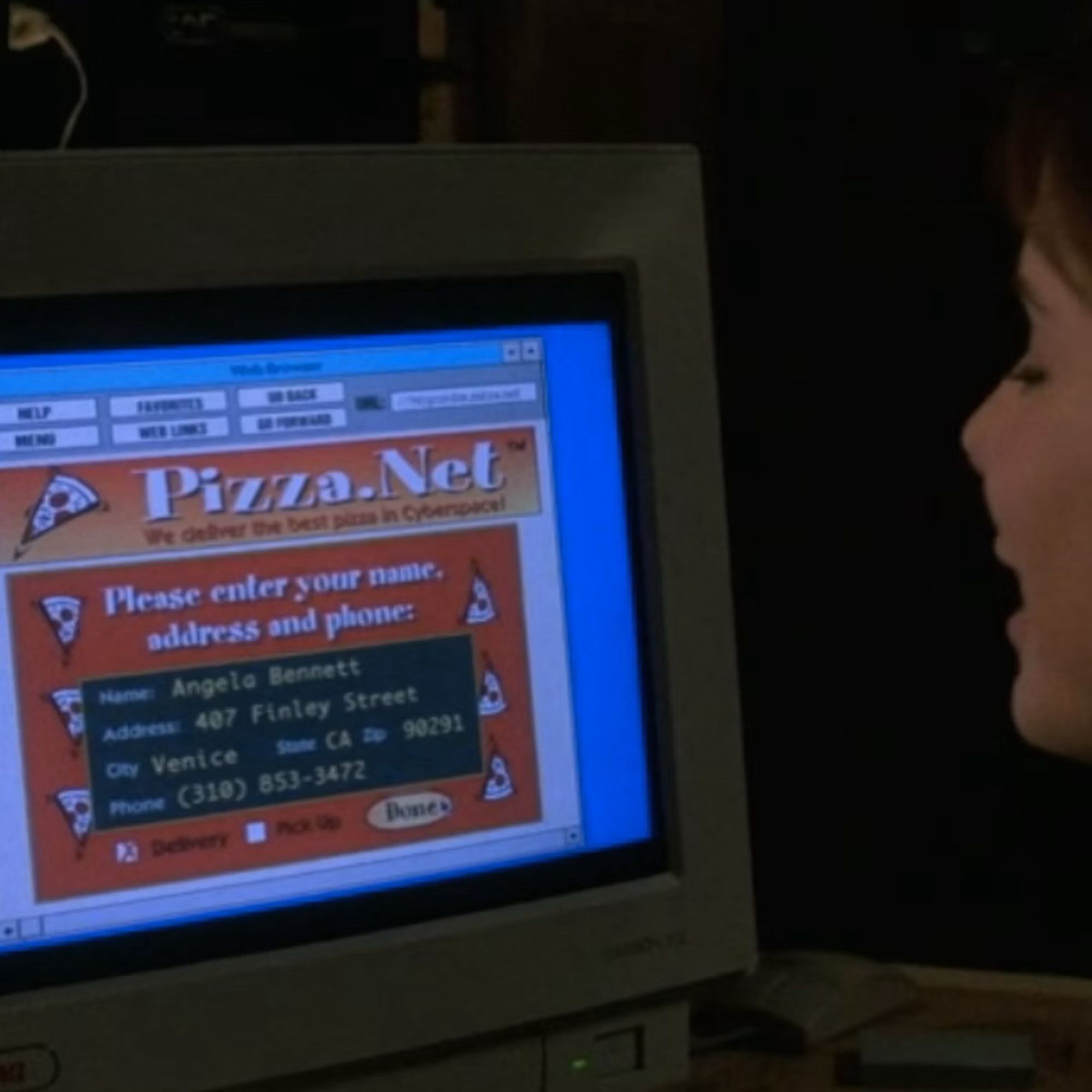 Sandra Bullock ordering from pizza.net in a scene from The Net